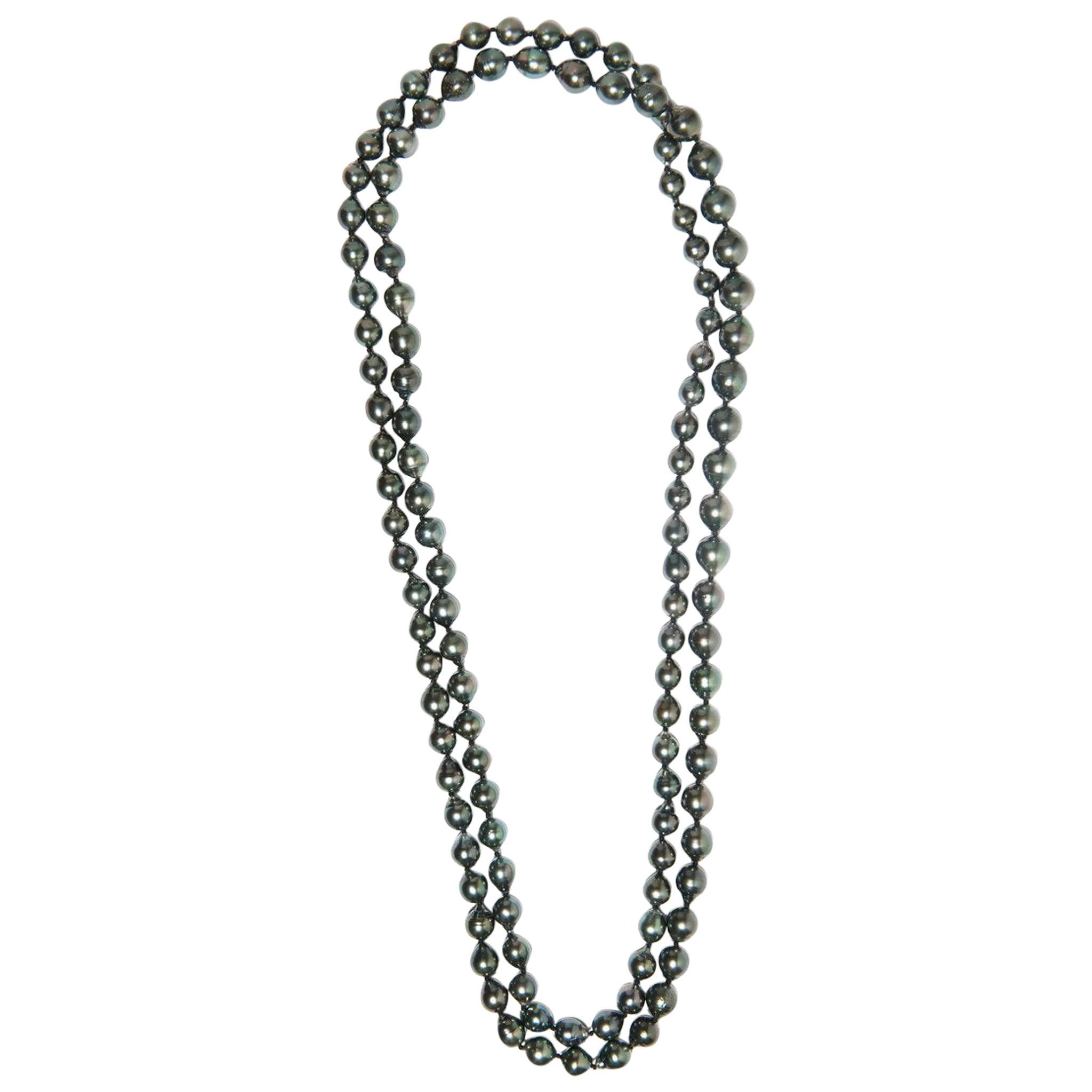 What seems like an endless strand of luscious midnight black Tahitian pearls can be worn day or night, dressed up or dressed down. Gabrielle would say that these Tahitian pearls are the ultimate in luxury.  

GSIVN208 Black Tahitian pearl 54” wrap