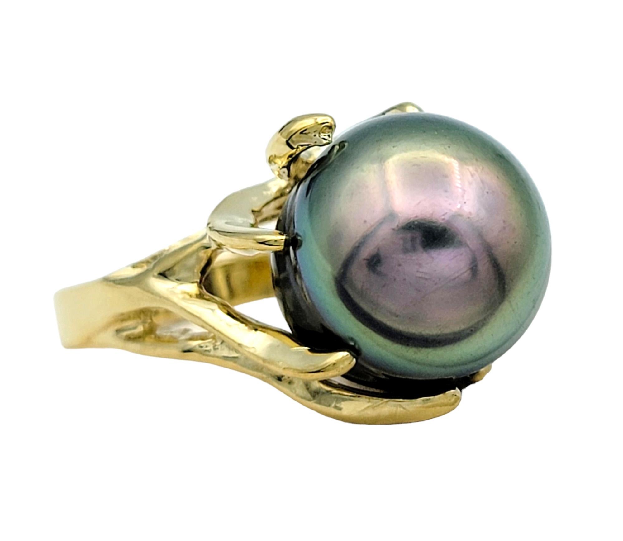Ring Size: 6.75

This elegant black Tahitian South Sea pearl ring is a captivating addition to any fine jewelry collection. Set within a branch-like motif crafted from 14 karat yellow gold, the ring evokes a gorgeous natural beauty.

The lustrous