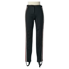Black tapered trousers with striped and rhinestone trimming Gucci