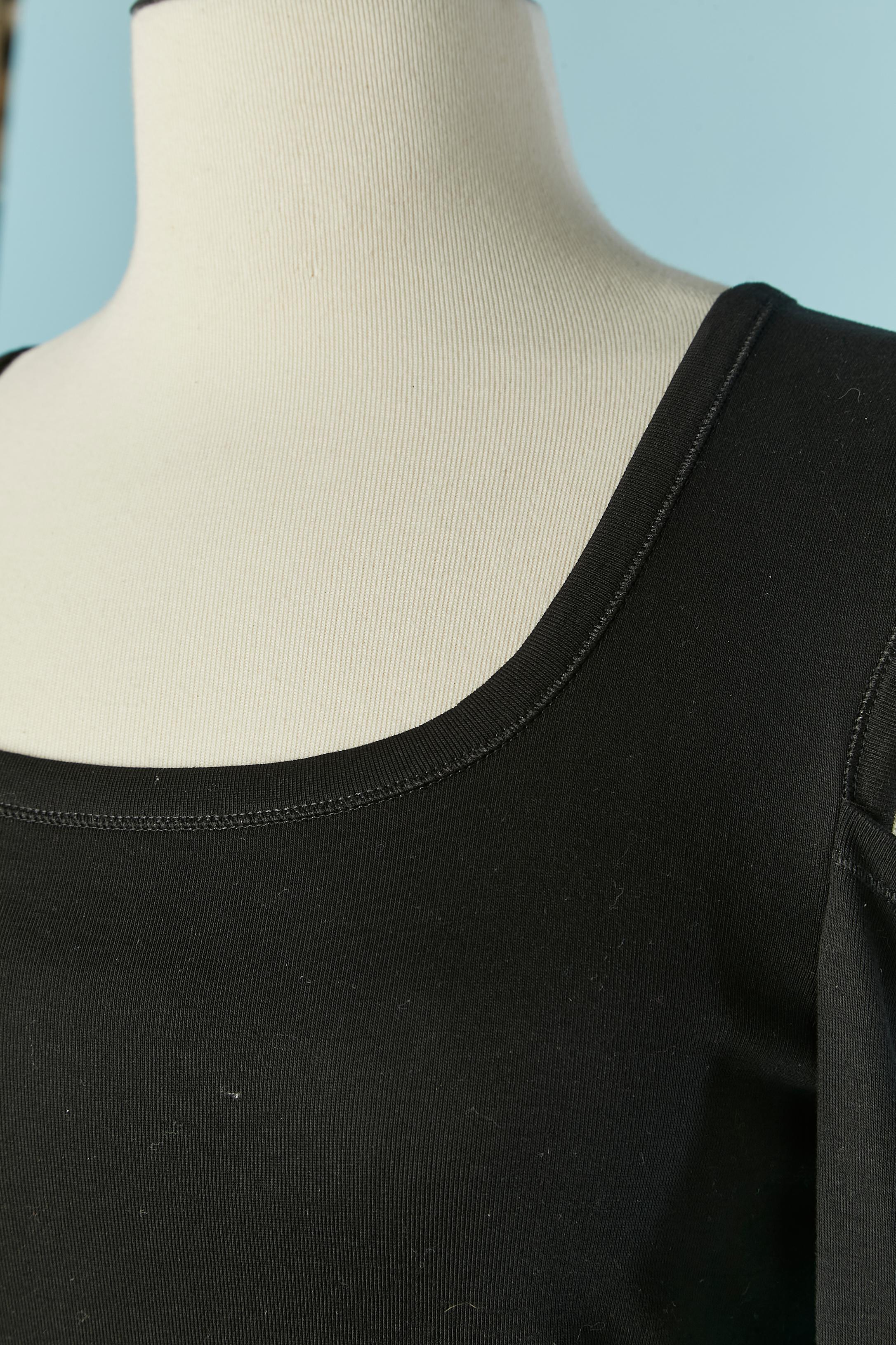 Black tee-shirt with cut-work. 
SIZE S 