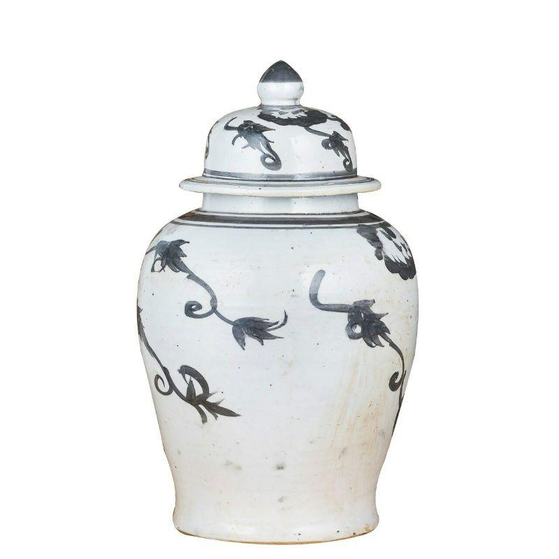 Black Temple Jar Vine Motif

The special antique process makes it looks like a piece of art from a museum. 
High fire porcelain, 100% hand shaped, hand painted. Distress, chips and other imperfections create great characters of this special