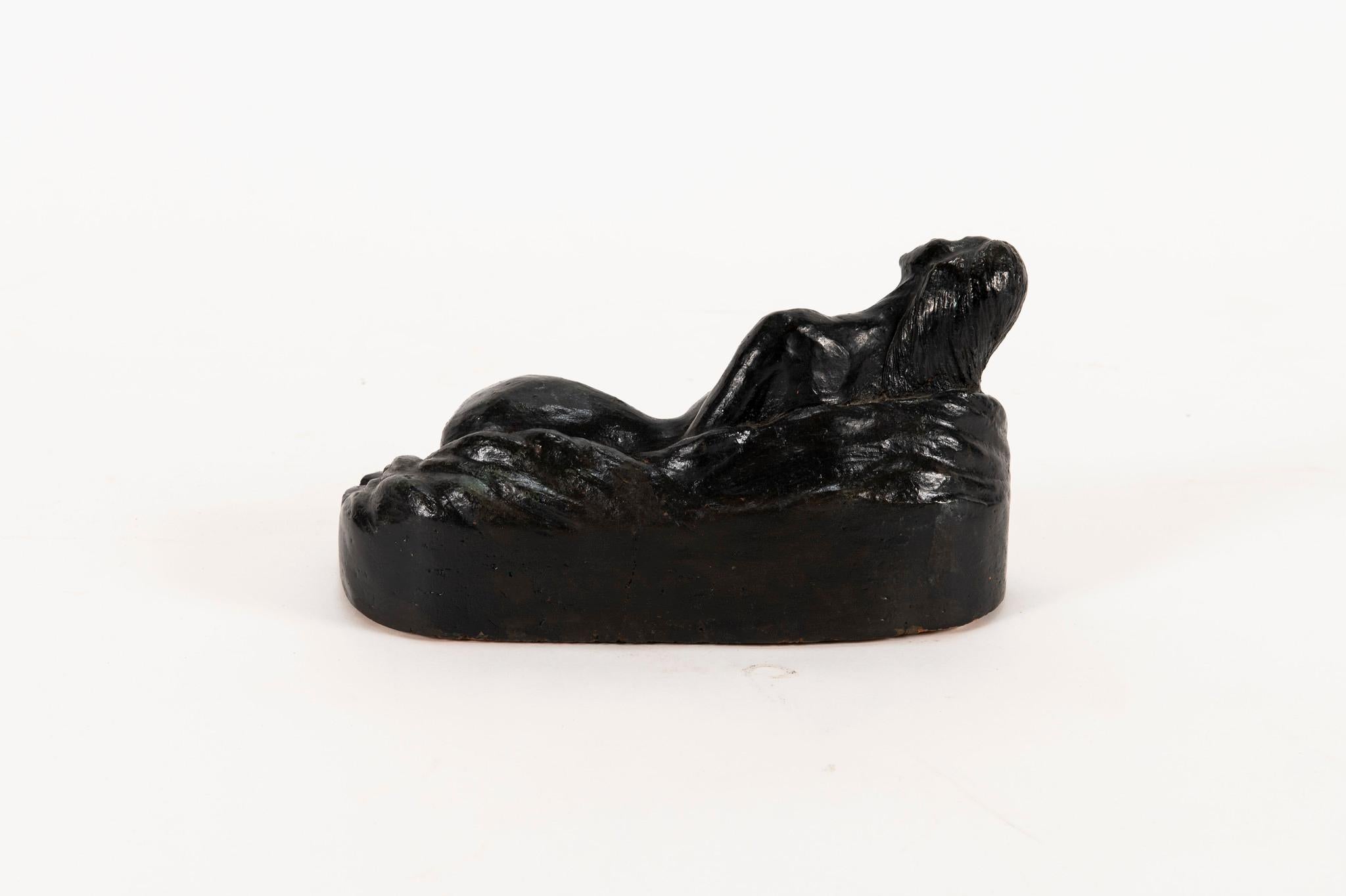 A French hand built terracotta clay sculpture of reclining nude female.