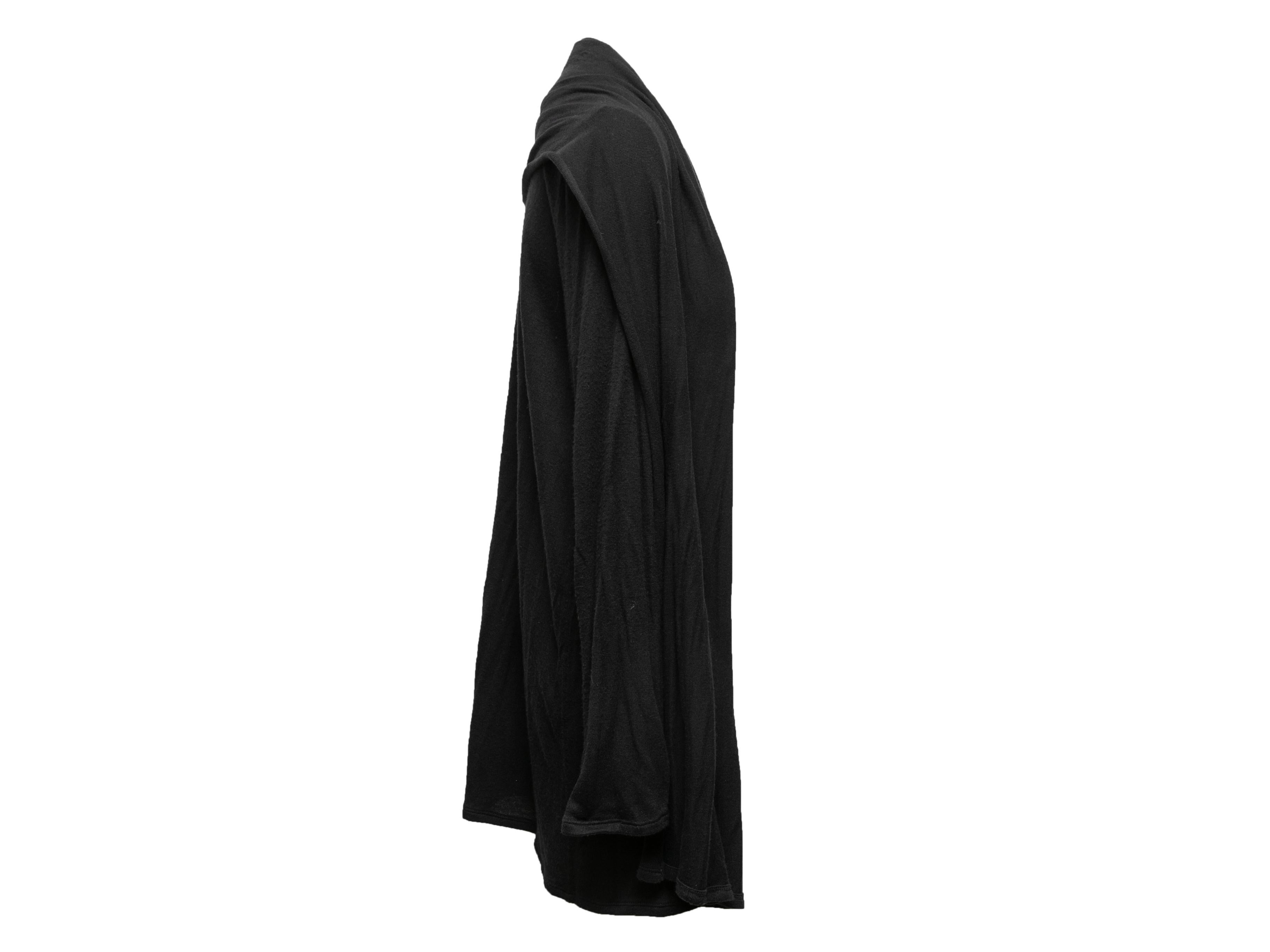 Black longline cardigan by The Row. Long sleeves. Open front. 42