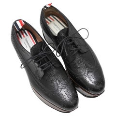 Scarpe brogue con zeppa nere di Thom Browne, taglia 40