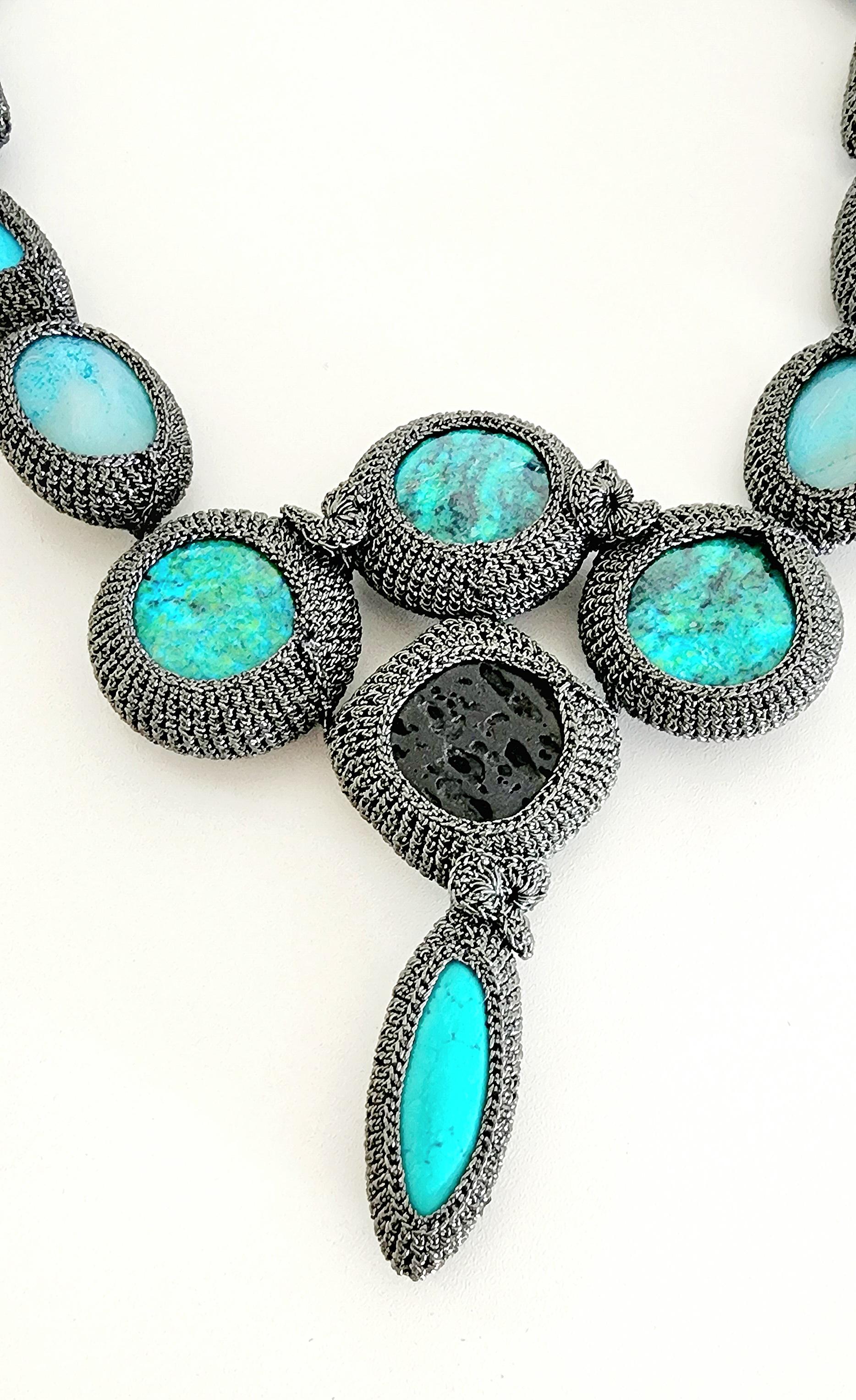 Beautiful, one of a kind statement necklace. Black Thread Crochet around various stones to create a unique, standout designer piece. Hand crochet meticulously which adds depth and creates a sparkly effect when worn. The Thread is a smooth passing