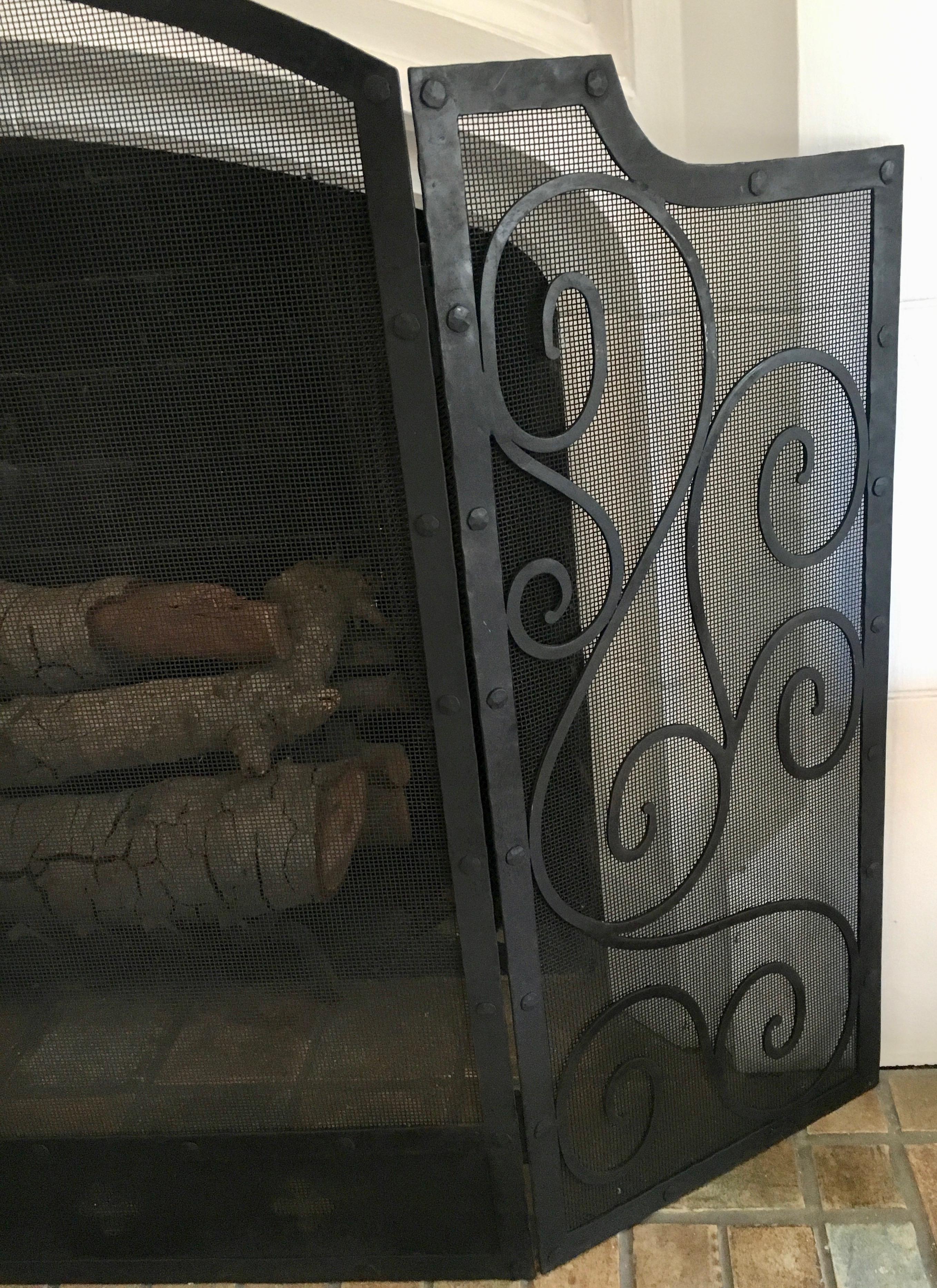 Black Three-Panel Wrought Iron Folding Fireplace Screen with Scroll Detail In Good Condition In Los Angeles, CA