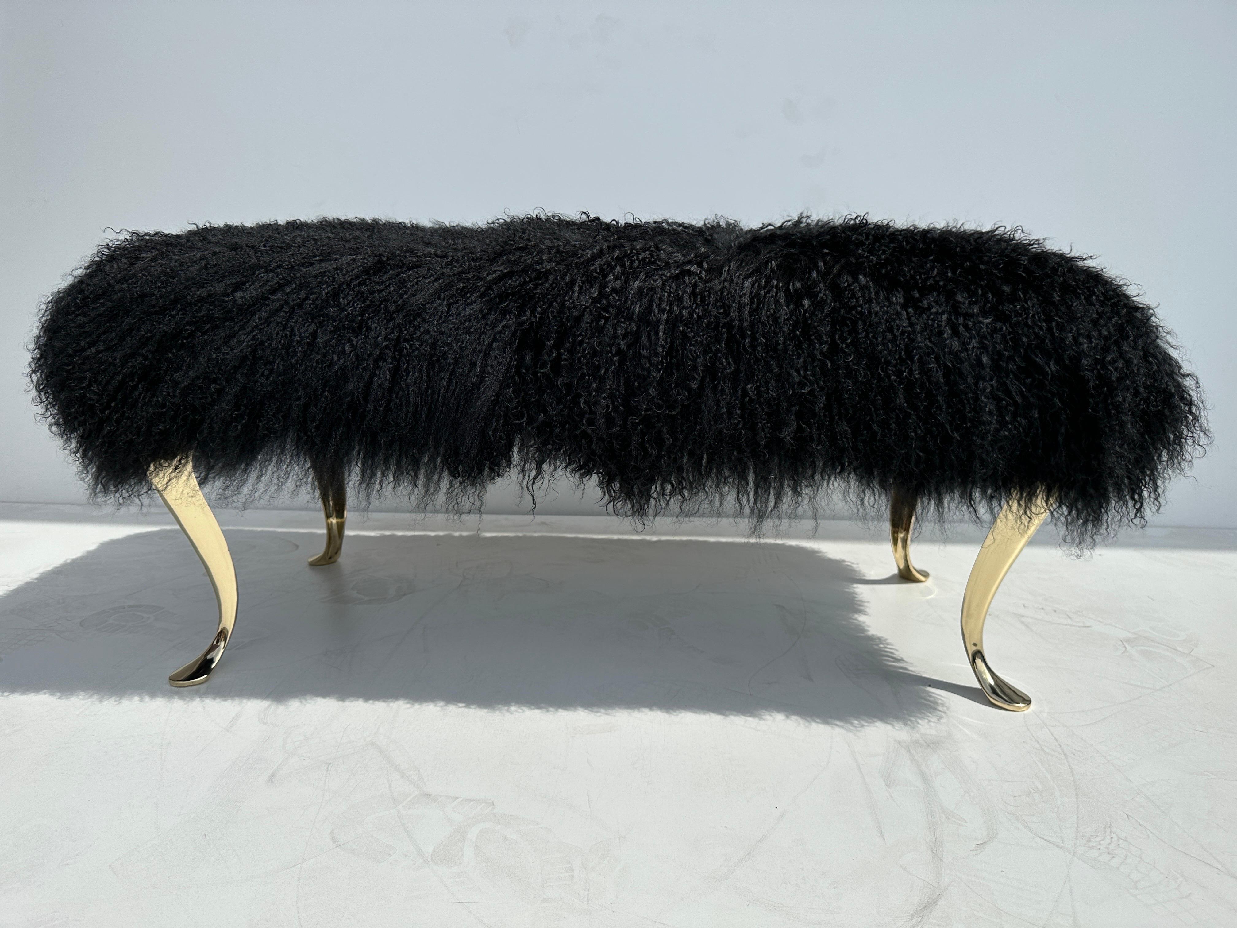 Black Tibetan sheep fur bench with polished brass cabriolet legs.
Brass legs are vintage Italian from 1970s. Fur upholstery is brand new.