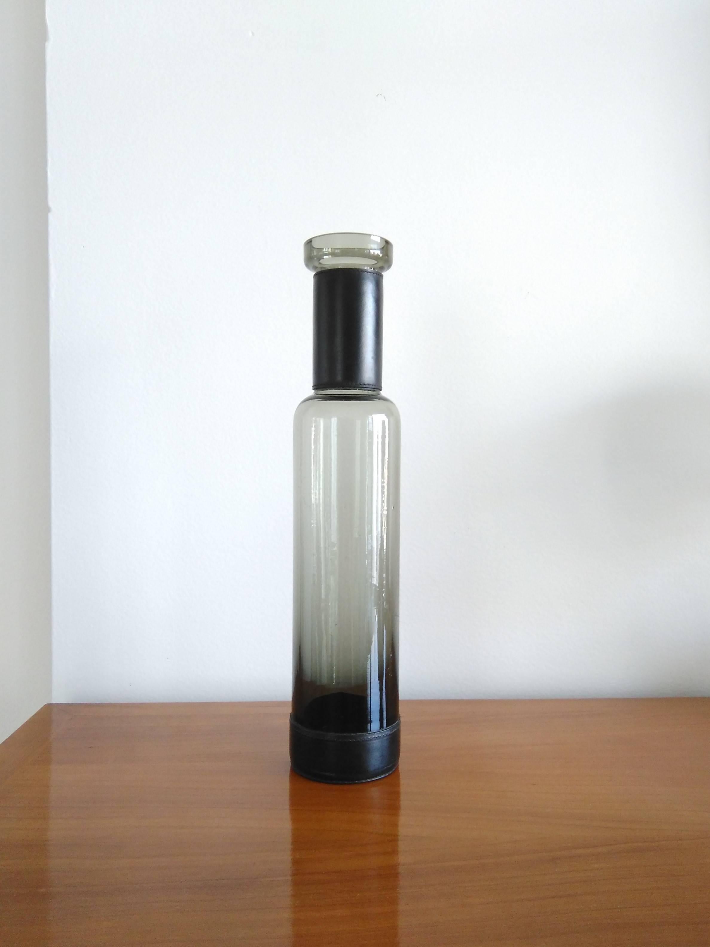 Sfumato effect thick glass bottle
leather details
this item will ship from France
price does not include handling, shipping and possible customs related charges.