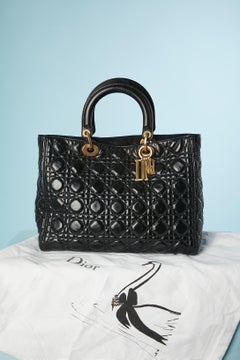 Black top-stitched leather handle bag Lady Dior Numbered 2016