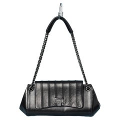 Black topstitched leather bag "Baguette" Chanel ( numbered)