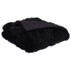 Couverture en fourrure de mouton Toscana noire avec dos en soie de JG Switzer