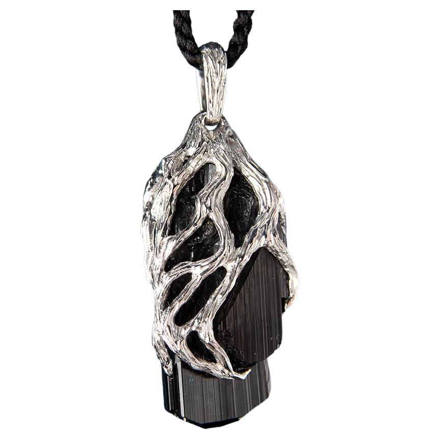 Blackened silver pendant with natural Black Tourmaline crystal
tourmaline origin - Namibia
crystal weight - 53 carats
crystal measurements - 1.06 х 1.18 in / 27 х 30 mm
pendant weight - 16.37 grams
pendant height - 1.73 in / 44 mm

Roots collection