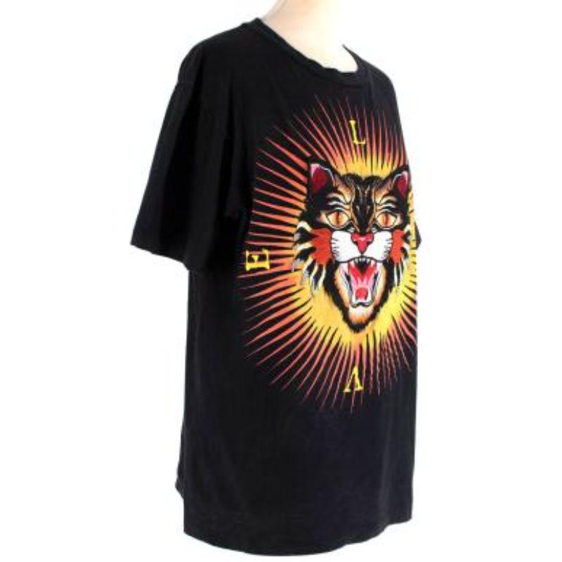 Gucci Cat Embroidered Black Cotton T-Shirt
 
 - Short sleeve Gucci t-shirt with large embroidered cat pattern and printed sun and lettering 
 - 'Modern future' written on the back of the shirt in old English script 
 - Scooped neckline with ribbed