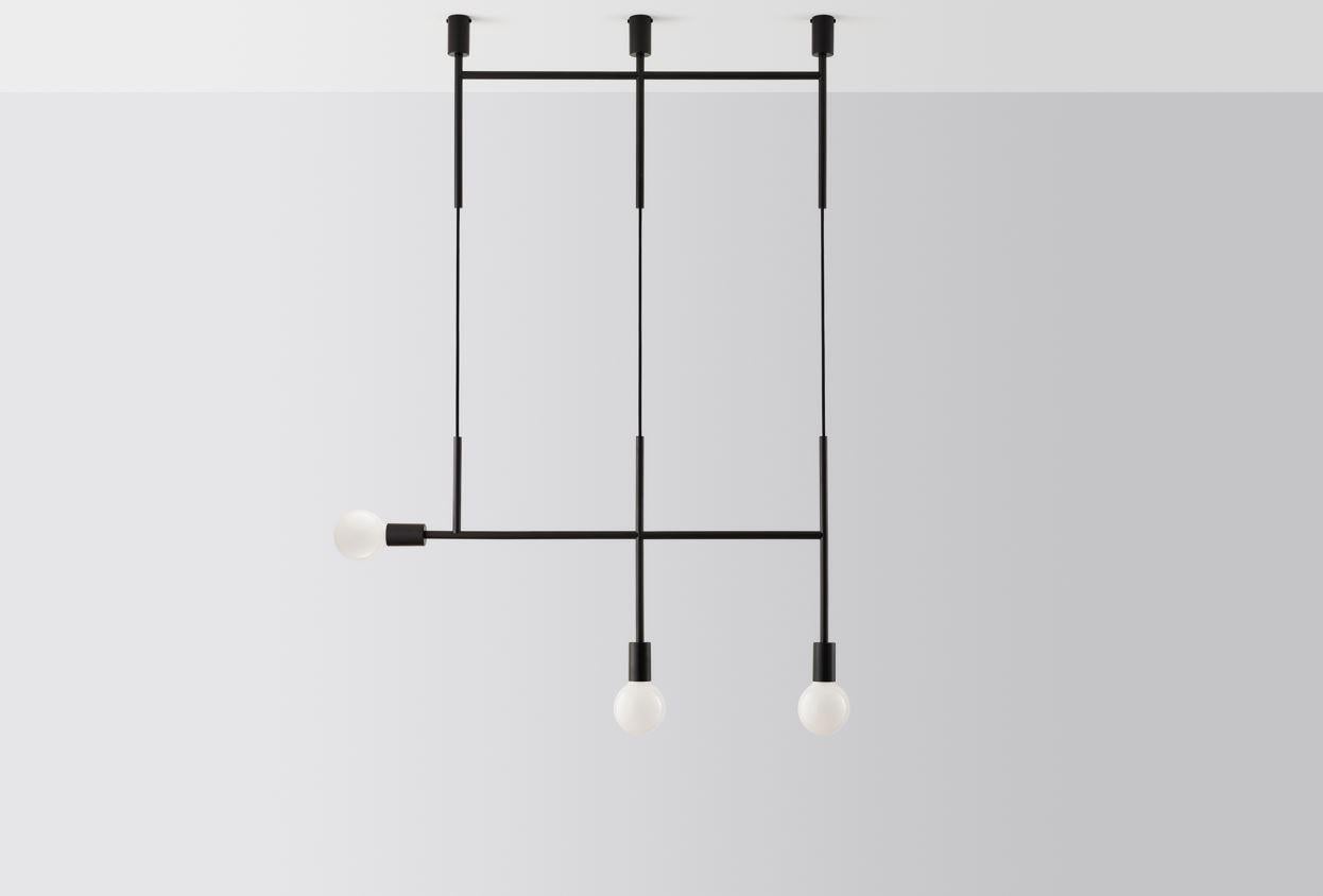 Black triple kick by Volker Haug
Dimensions: W 98.7 x H min 108 cm
Materials: Polished, bronzed brass or steel
Finish: Raw, satin lacquer or powdercoat
Weight: approx 3.5 kg

Lamp: 240V E27 (120V E26 US)
Custom finishes available on