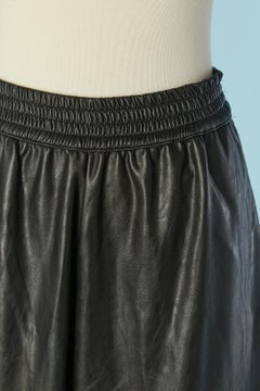Pantalon noir en simili-cuir avec fente MM6 Maison Margiela