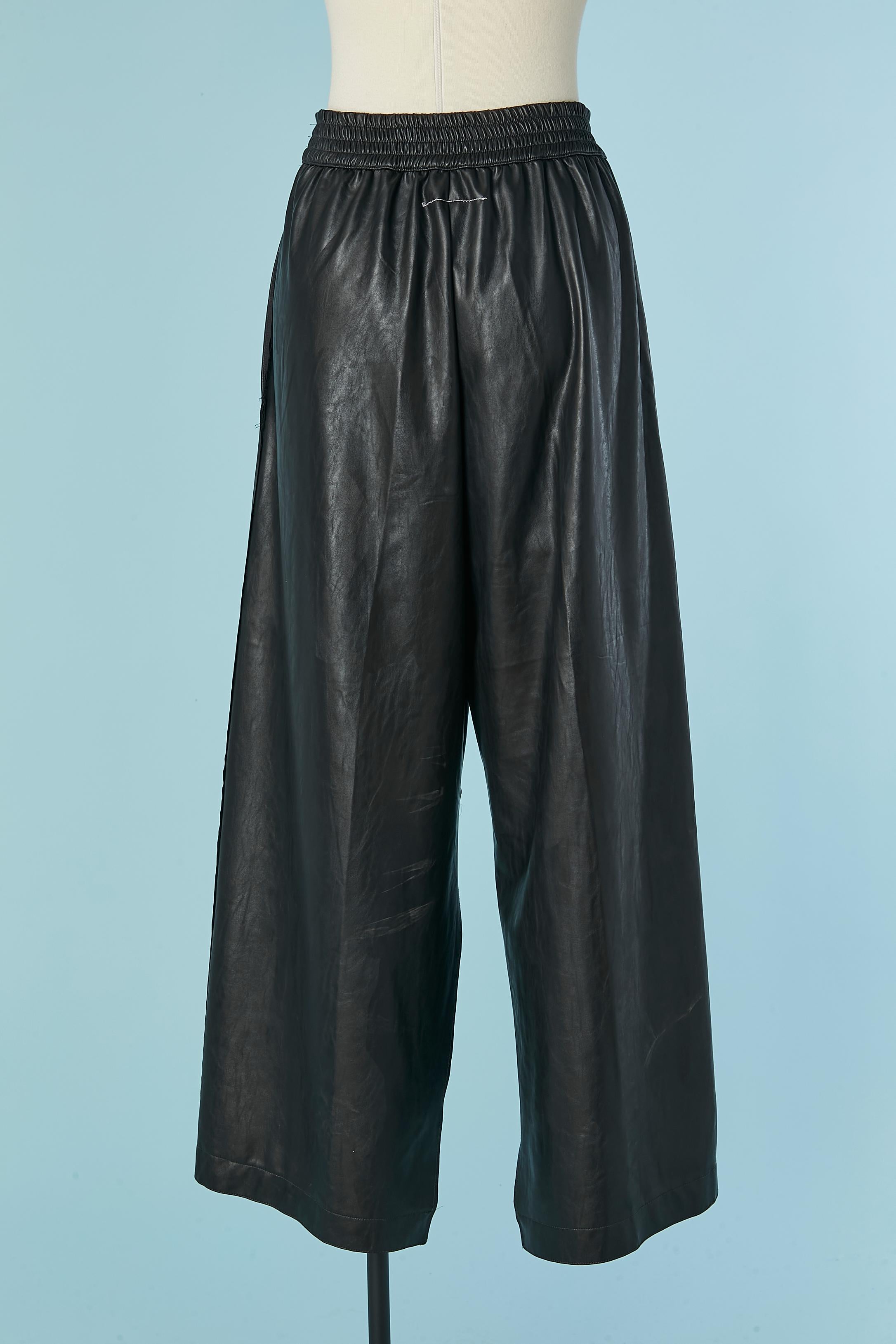 da uomo o donna Pantaloni neri in ecopelle con spacco MM6 Maison Margiela in vendita