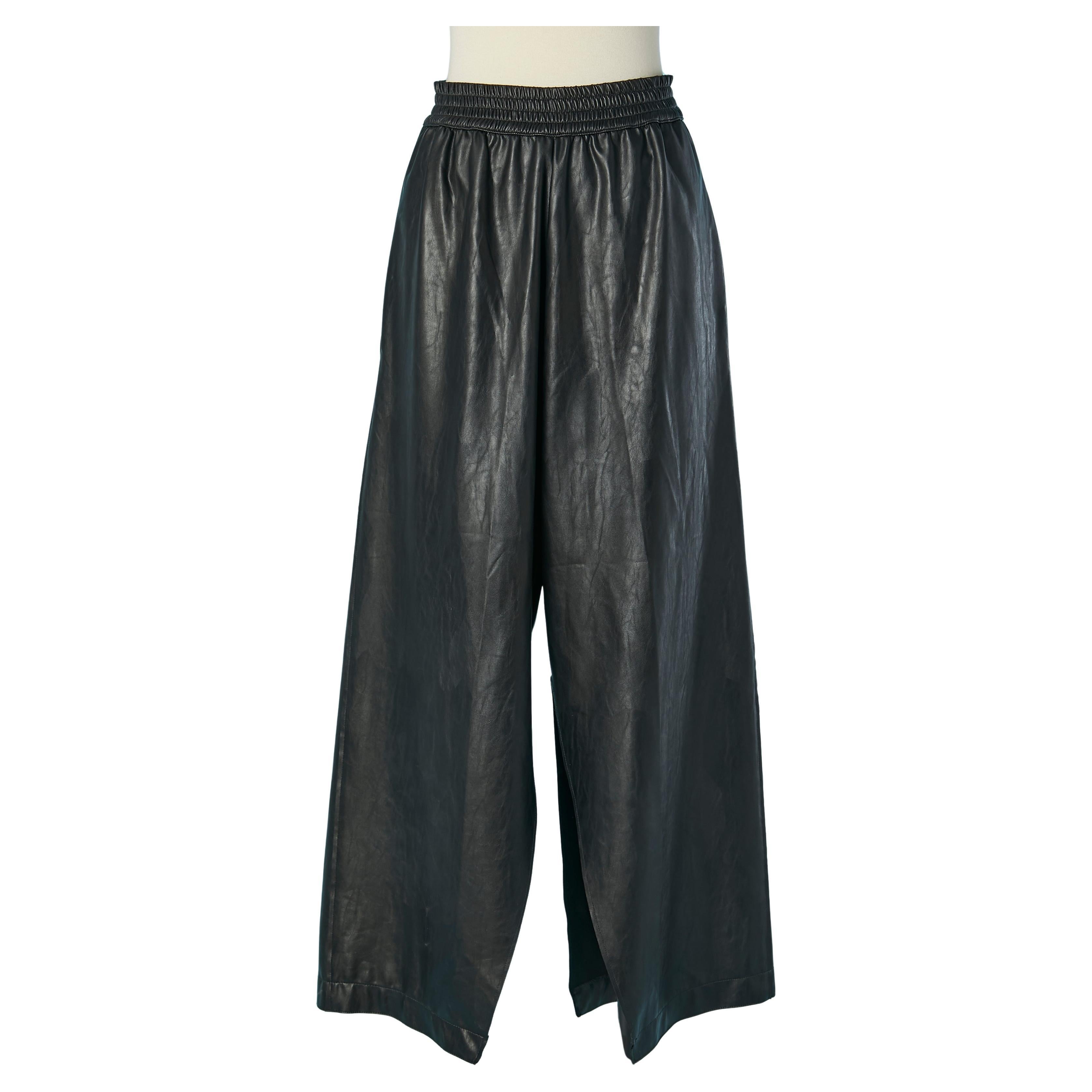 Pantaloni neri in ecopelle con spacco MM6 Maison Margiela in vendita