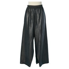Pantaloni neri in ecopelle con spacco MM6 Maison Margiela