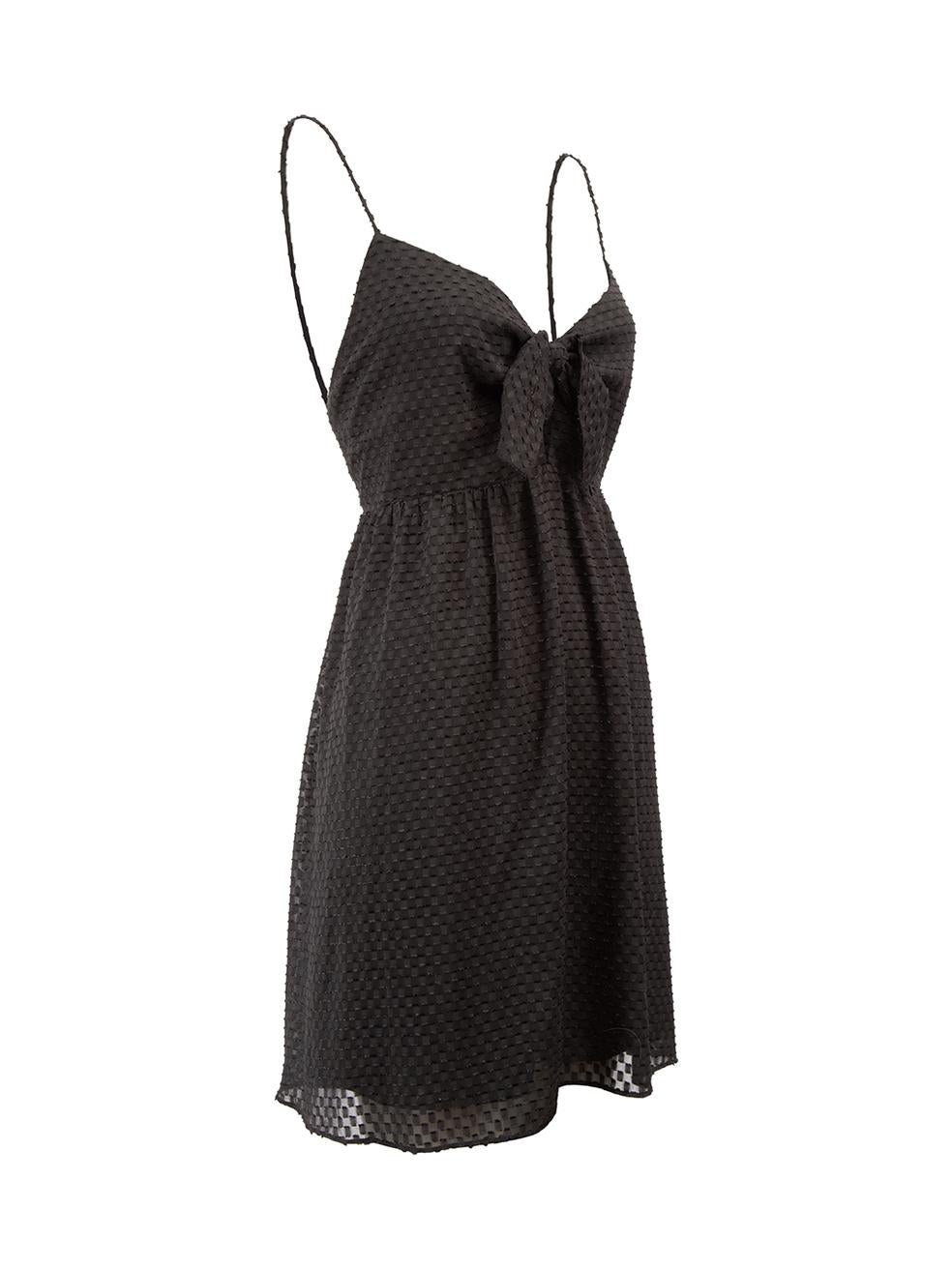 CONDITION is Very good. Hardly any visible wear to top is evident on this used Alice + Olivia designer resale item.
 
 Details
  Black
 Polyester
 Tank top
 Tufted texture
 V neckline
 Bow detail with cut out accent
 Shirred back panel
 Back zip