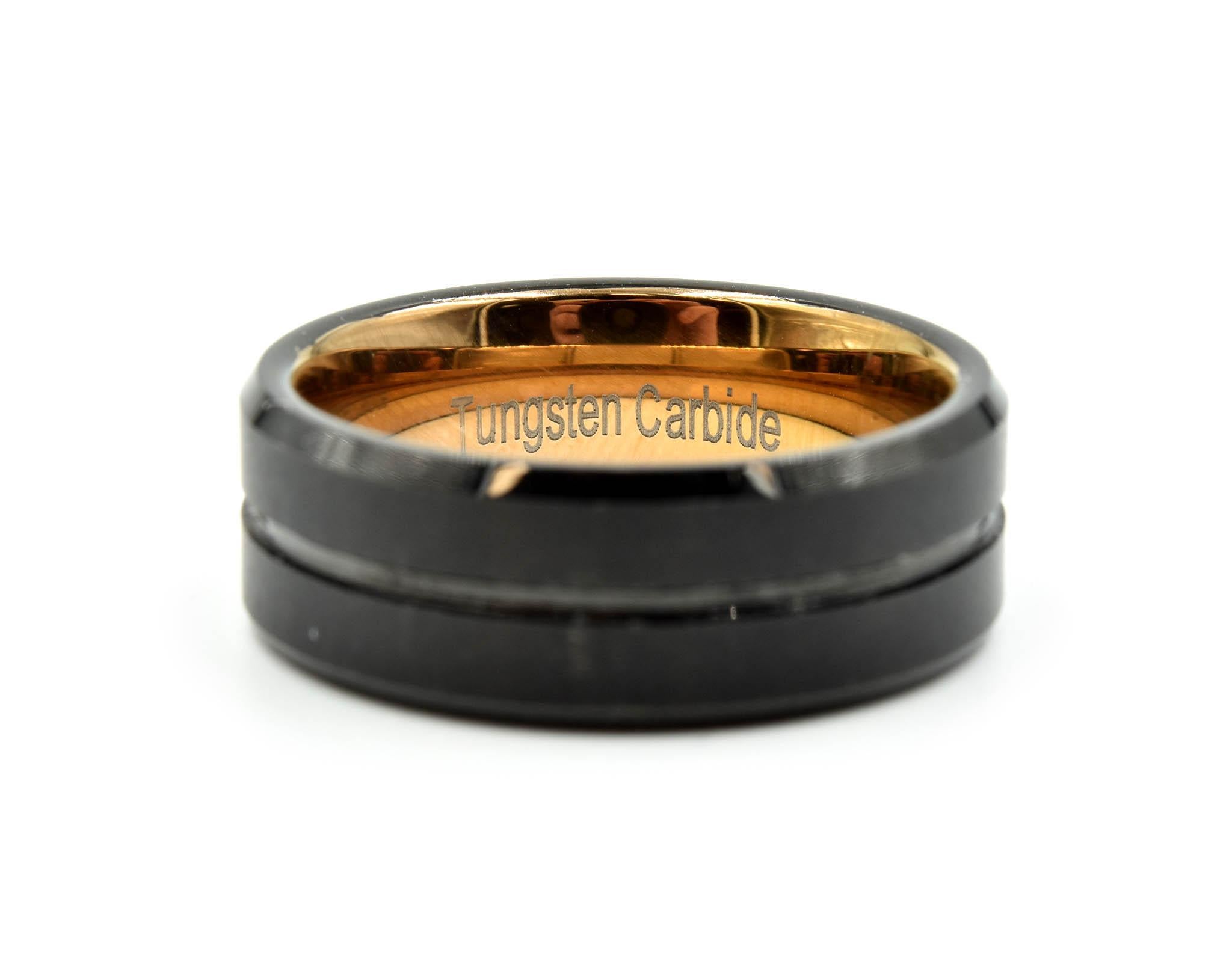 This is a men’s band made in black tungsten carbide and is a size 9. This band measures 8mm long; 2.35