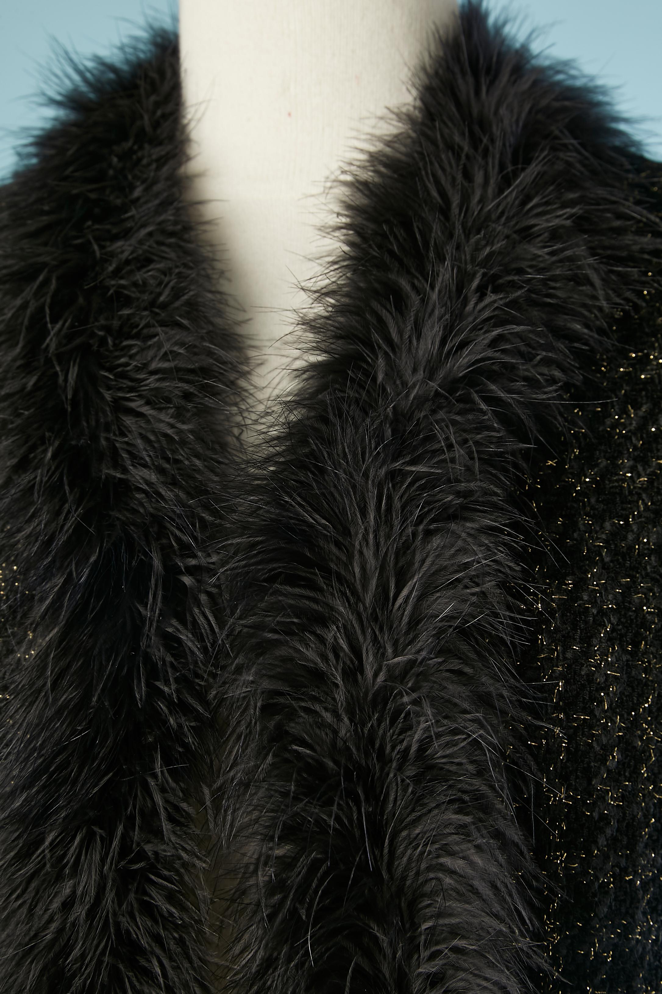 Black tweed and lurex vest with feather edge. No fabric composition tag but the lining is probably acetate 
SIZE M 