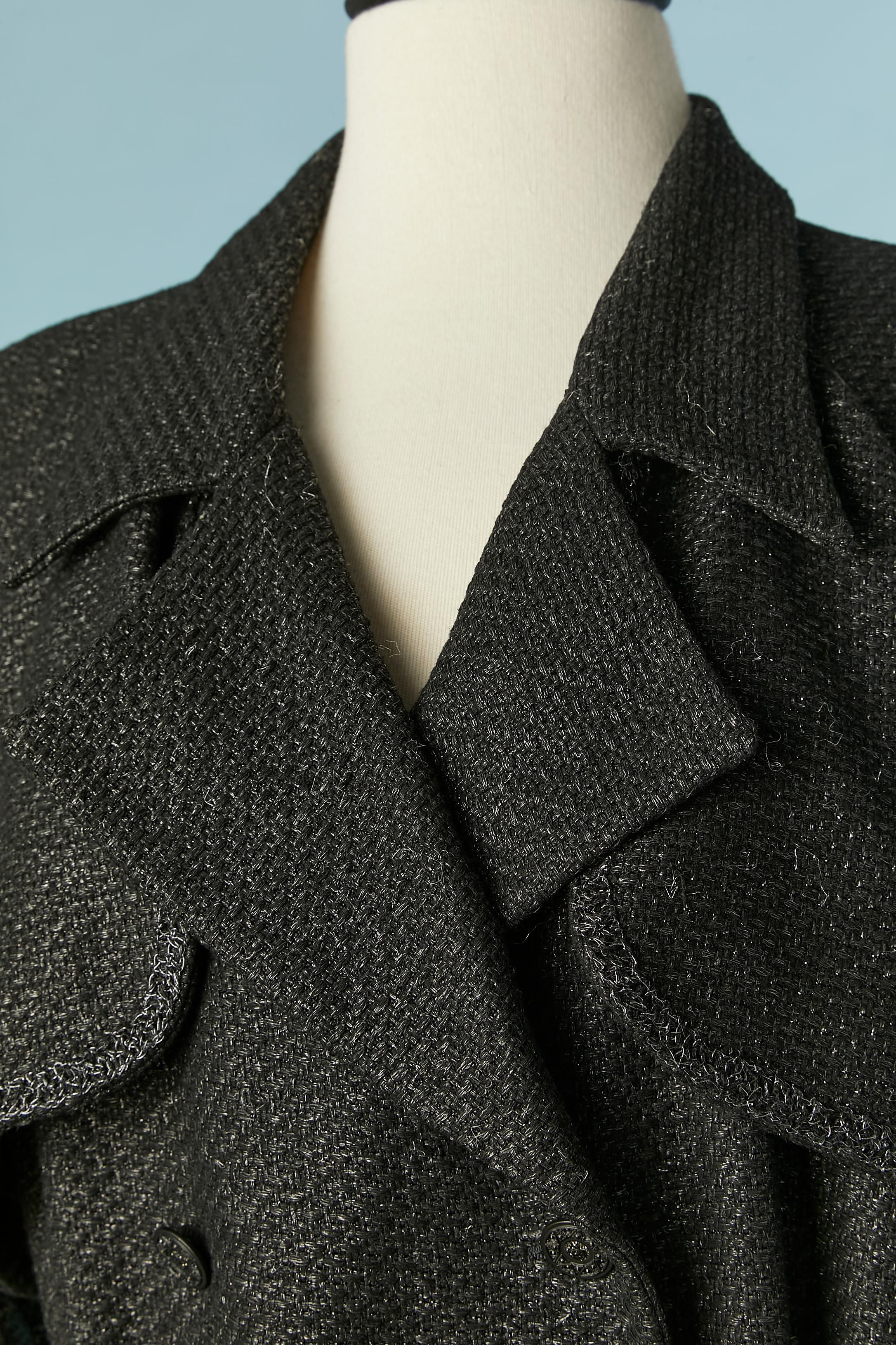 Black tweed double-breasted trench-coat.
Main fabric composition: 56% rayon, 19% wool, 14% linen, 10% nylon, 1% polyester. 
Black silk lining. Shoulder pad. Raglan. 
SIZE 42 (Fr) 12 (Us) L 