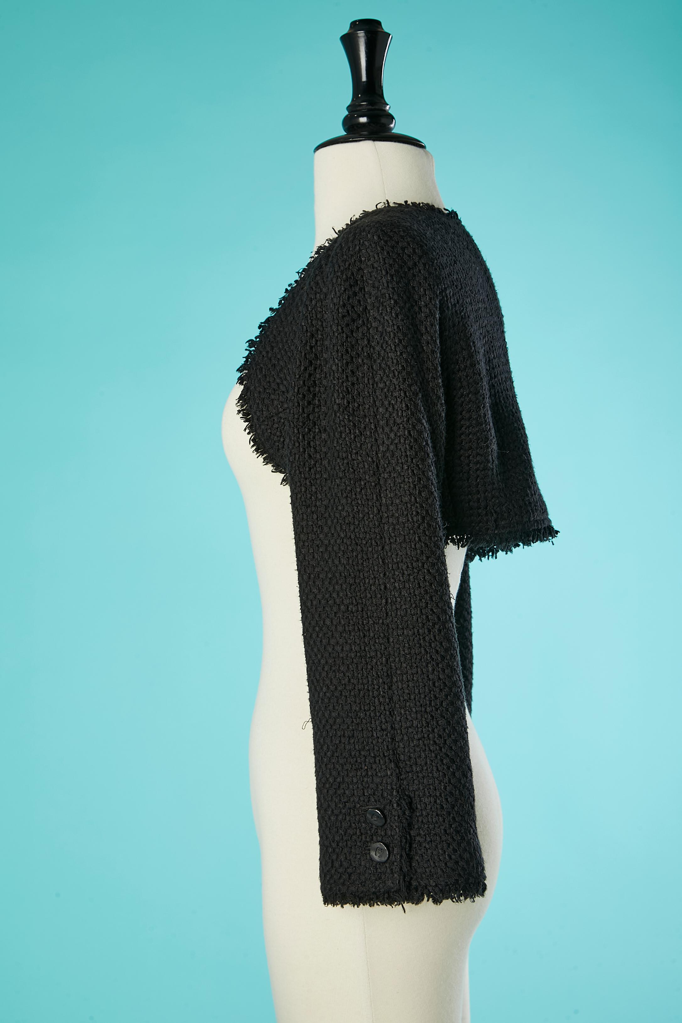 Veste en tweed noir avec manches amovibles Chanel en vente 8
