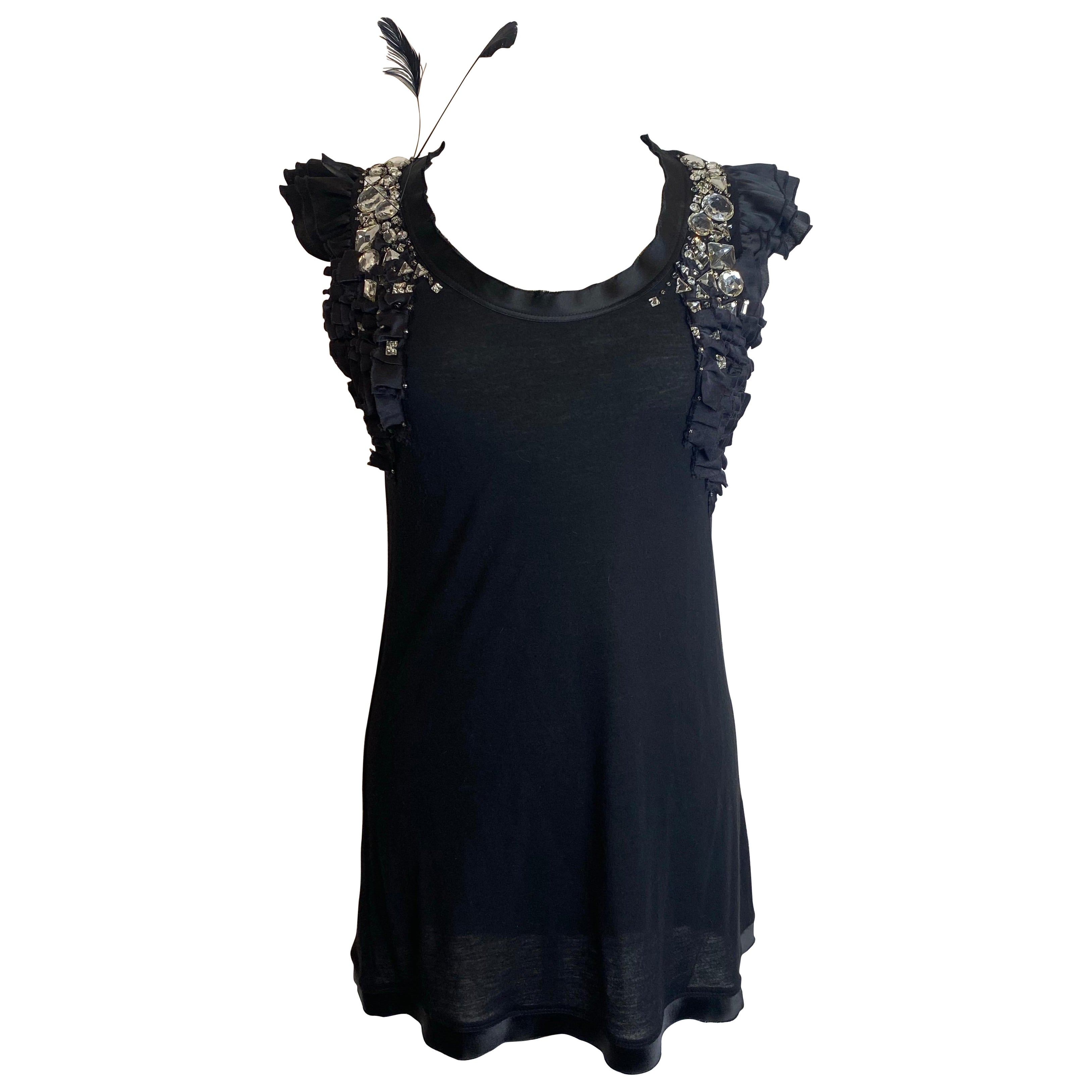 Camiseta negra de plumas Valentino Couture.