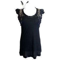 Camiseta negra de plumas Valentino Couture.
