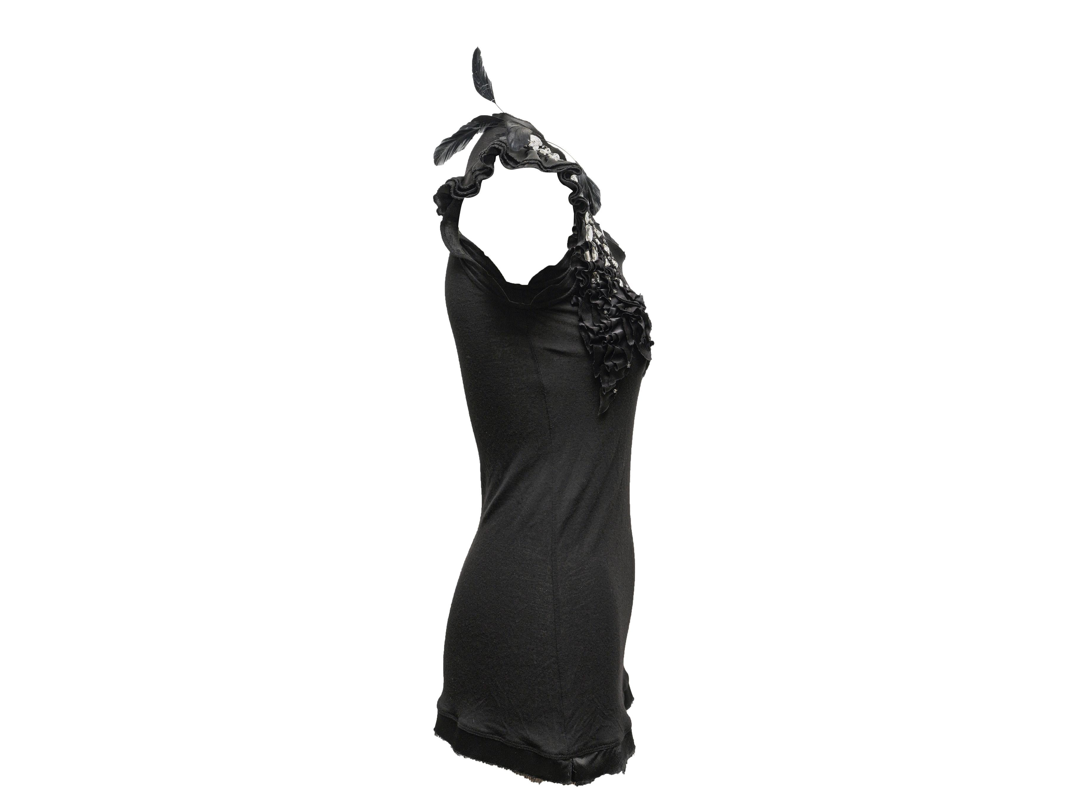 Product Details: Black embellished cap sleeve top by Valentino T-Shirt Couture. Ruffle, feather, and rhinestone trim throughout. Scoop neck. 30