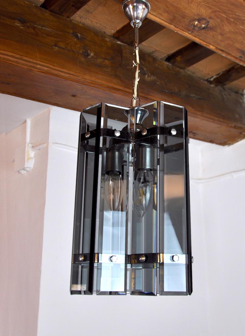 Veca chandelier designed and produced in the 70s in murano, Italy. Chrome structure and black murano glass crystals in good condition. Rare design object that will illuminate your interior wonderfully. Electricity checked, marks of time relating to