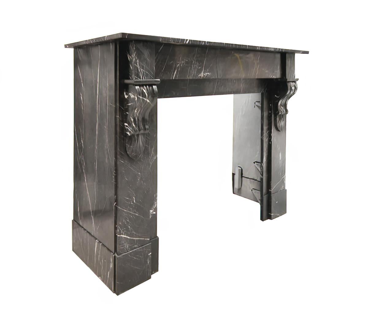 Black-veined marble Modillion fireplace mantel from the early
20th Century to place around the chimney.
See all dimensions in the last picture.