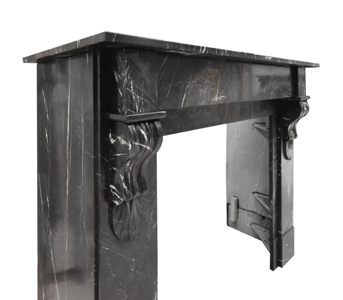 Belgian Black-veined marble Modillion fireplace mantel early 20th Century For Sale