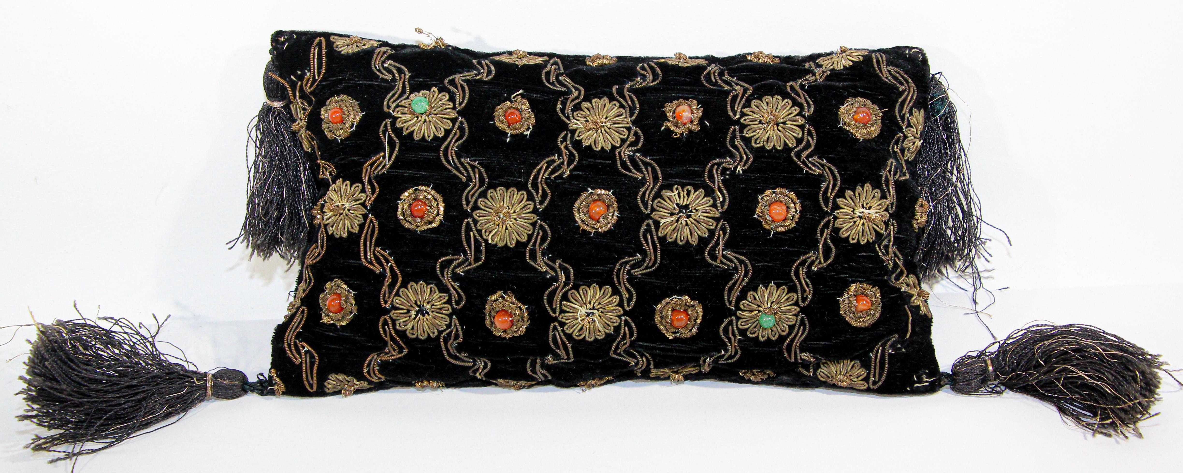 Black Velvet 1960s Zardozi Zari Gemstone Pillow, India.
Beautiful 1960s Zardozi Zari gem-set black velvet embroidered with metallic gold threads and decorated with coral and turquoise stones.
Handcrafted very small pillow with tassels.
Measures: