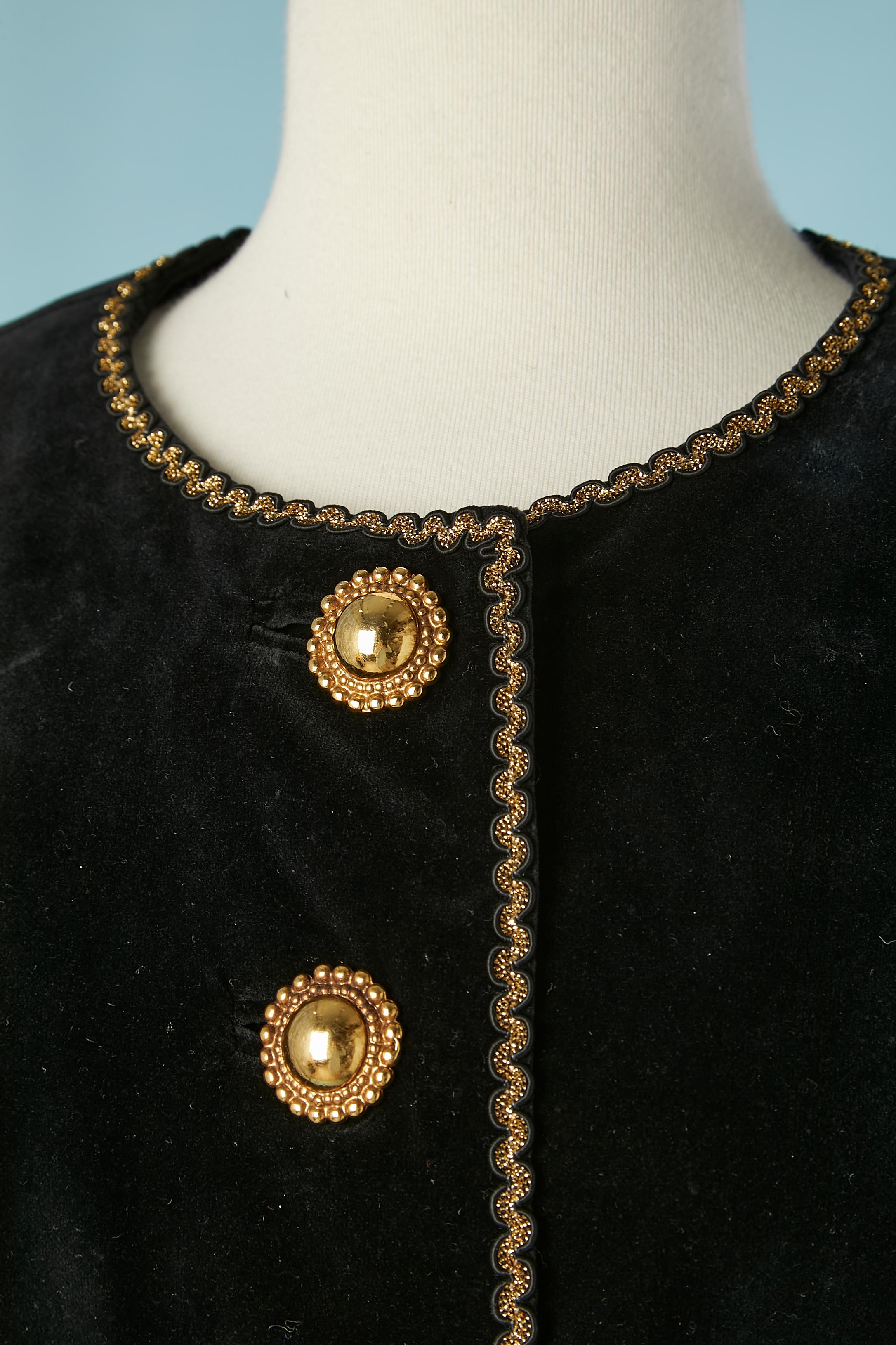 Black velvet cocktail skirt suit with gold metal buttons and gold lurex braid on waist and edge. 
Fabric composition: 70% cotton, 30% Cupro ( kind of rayon) 
Shoulders pads. 
SIZE 44 (Fr) 14 (US) 
