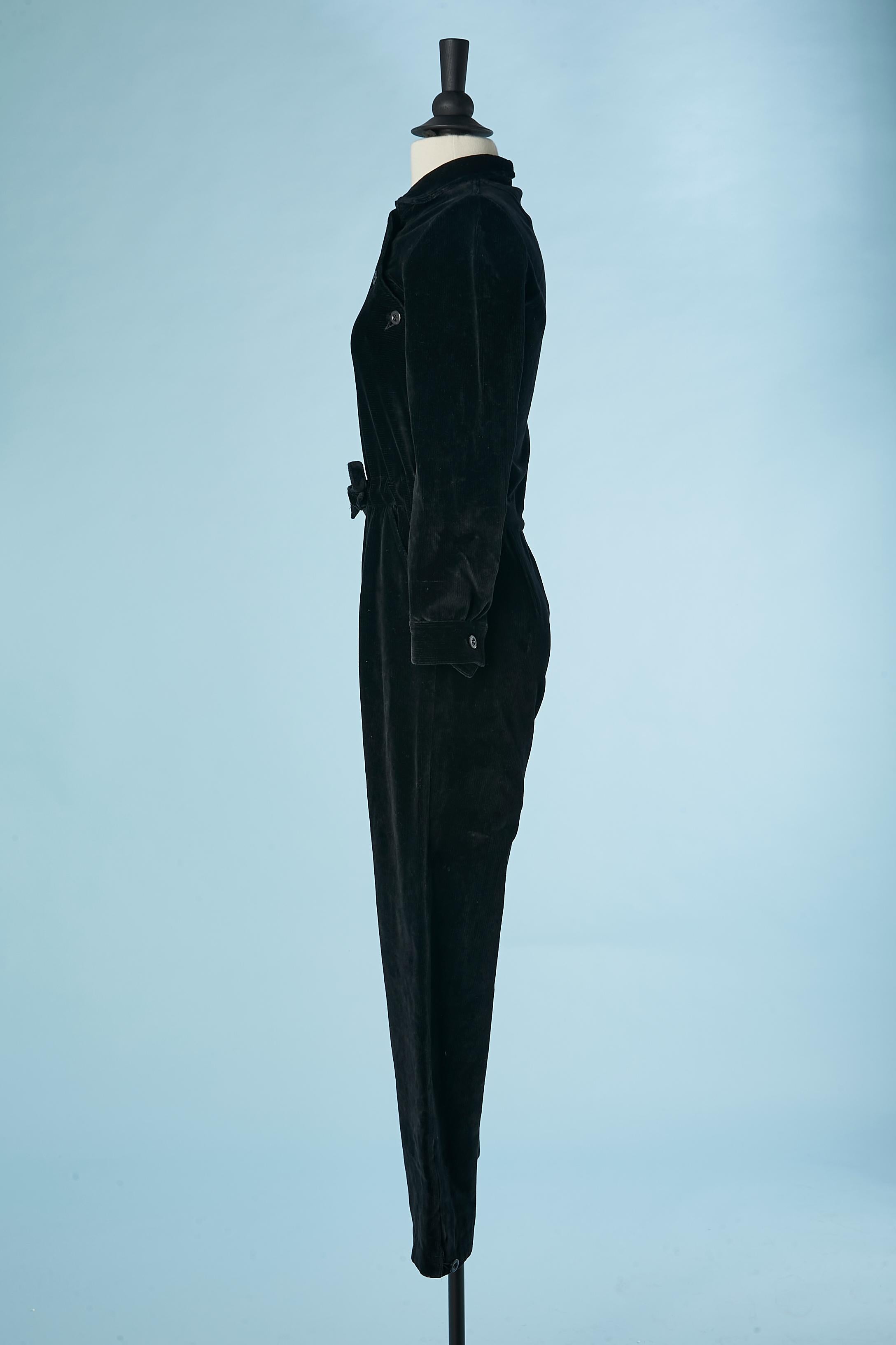 Black velvet jumpsuit with asymmetrical button placket Courrèges Circa 1970's  For Sale 1