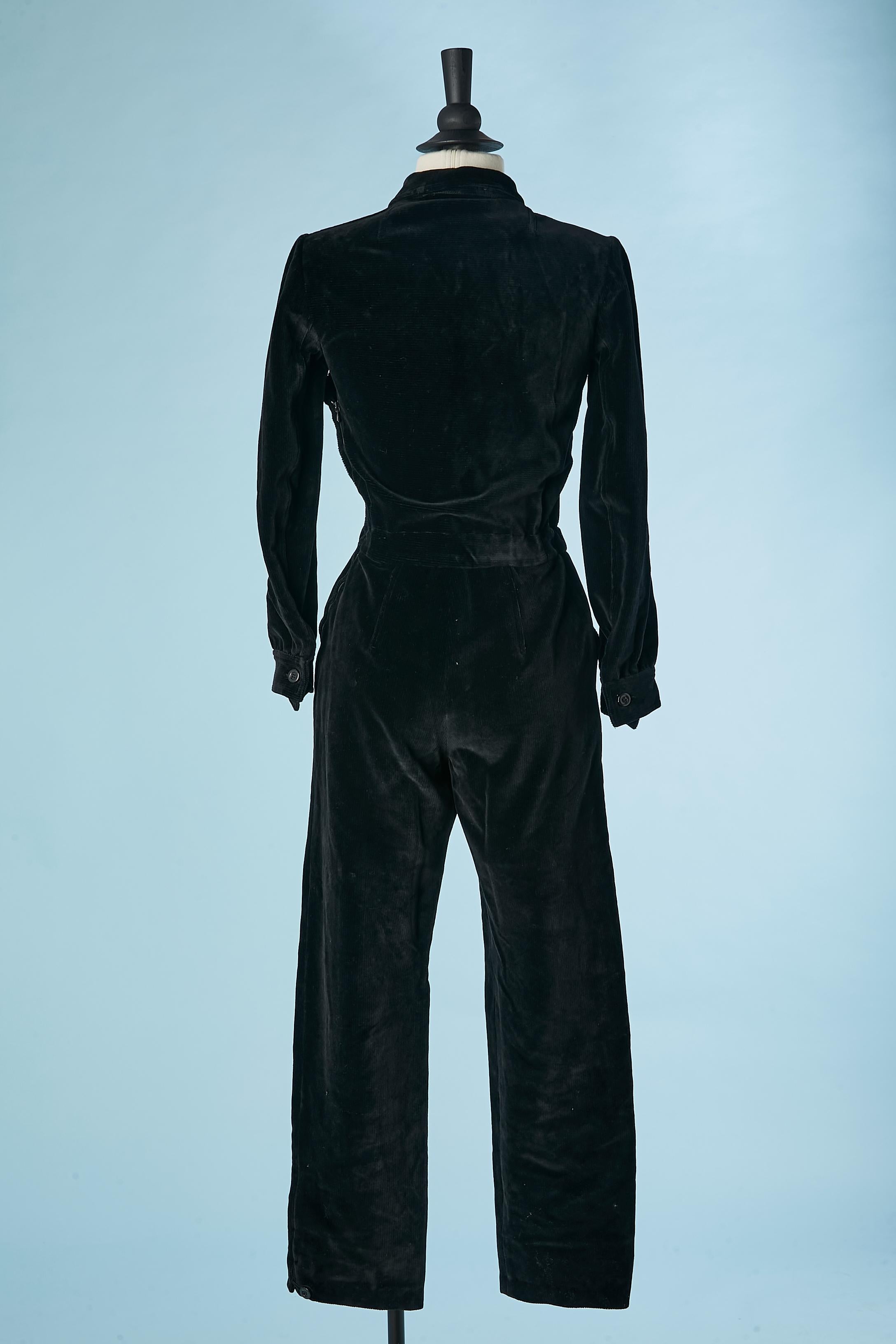 Black velvet jumpsuit with asymmetrical button placket Courrèges Circa 1970's  For Sale 2
