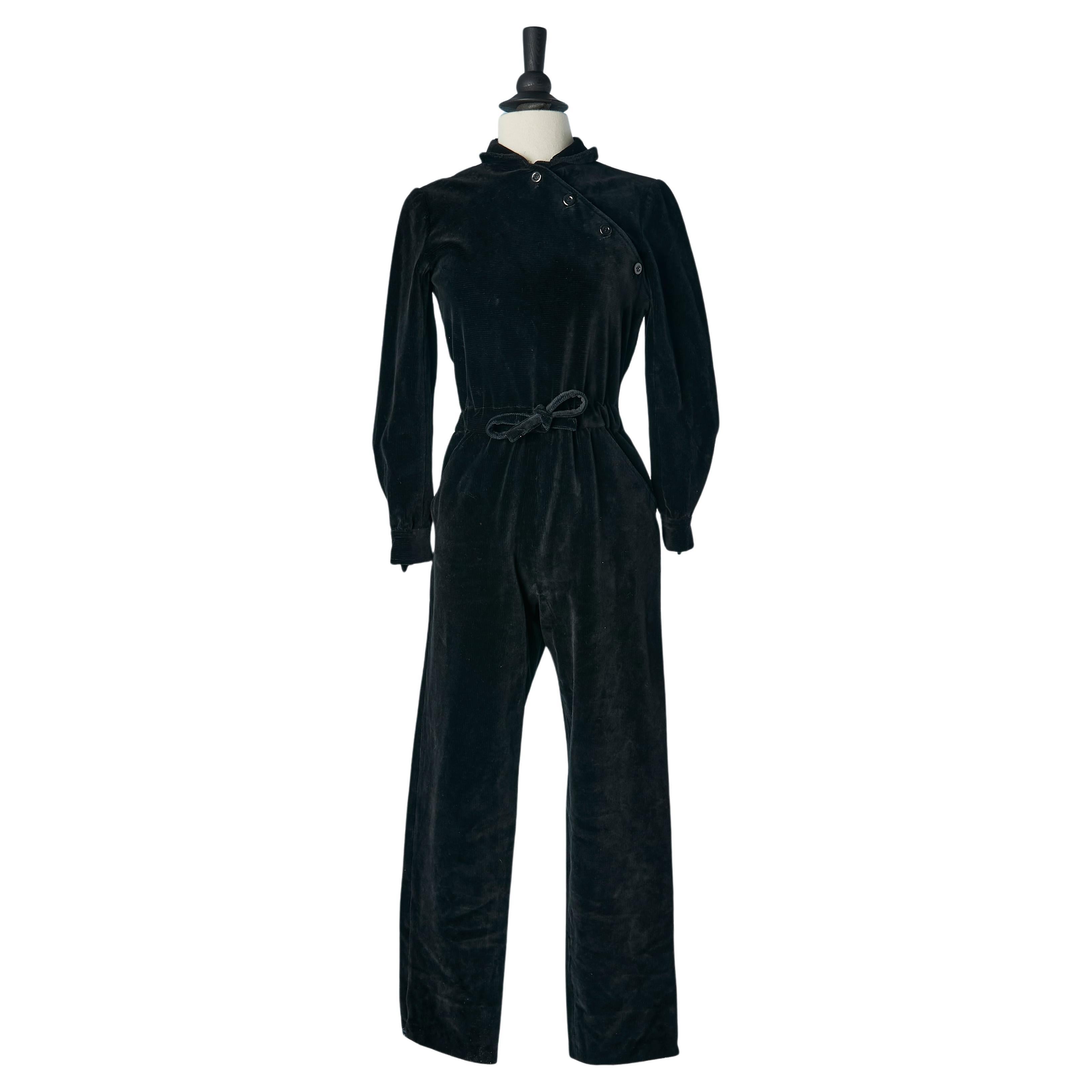Black velvet jumpsuit with asymmetrical button placket Courrèges Circa 1970's  For Sale