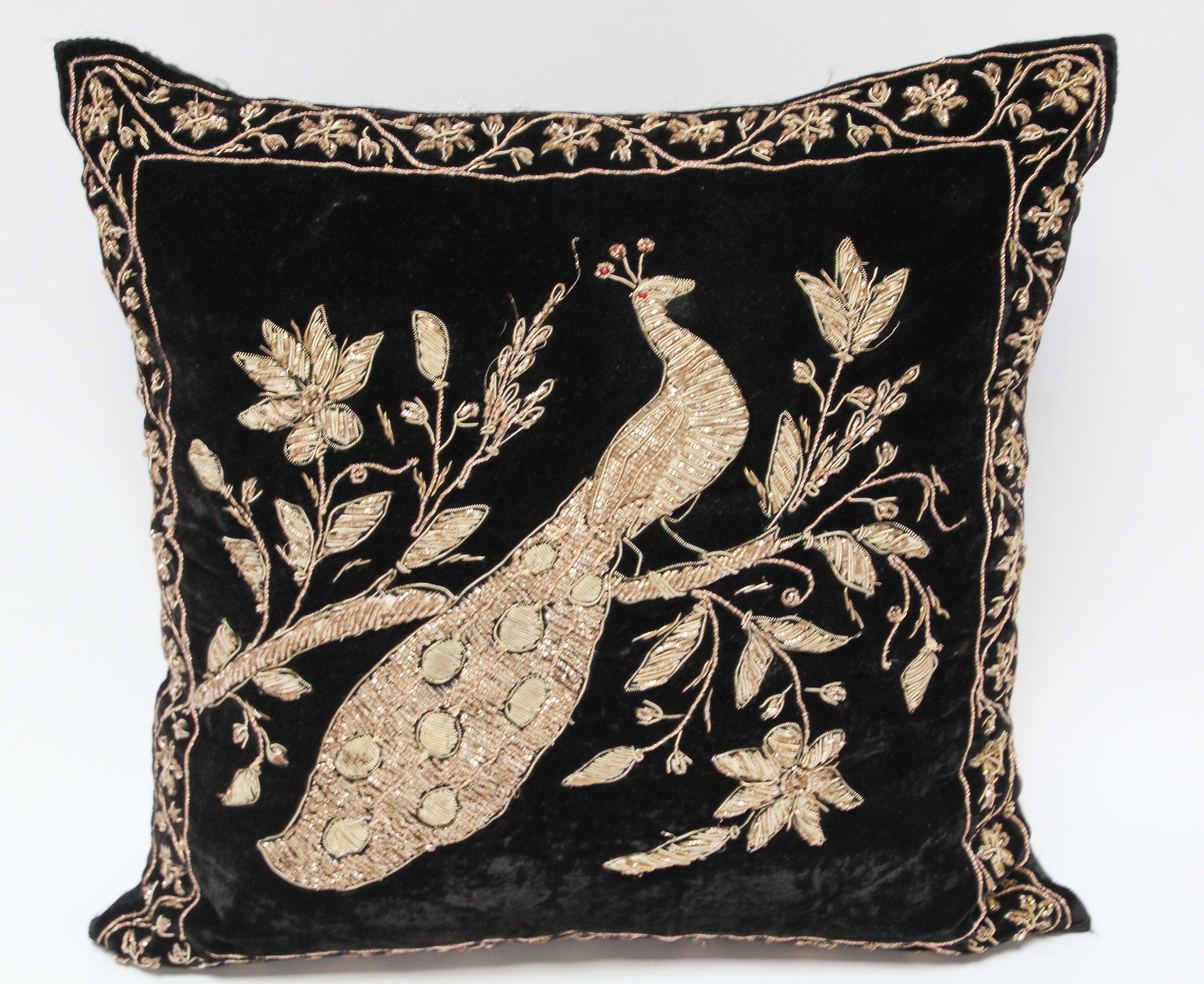 Black Moorish silk velvet pillow hand embroidered with gold metallic threads and sequins depicting a royal peacock on a branch.
Gold metallic thread embroidered with silver and ruby red with white pearls.
Handcrafted and embroidered vintage throw