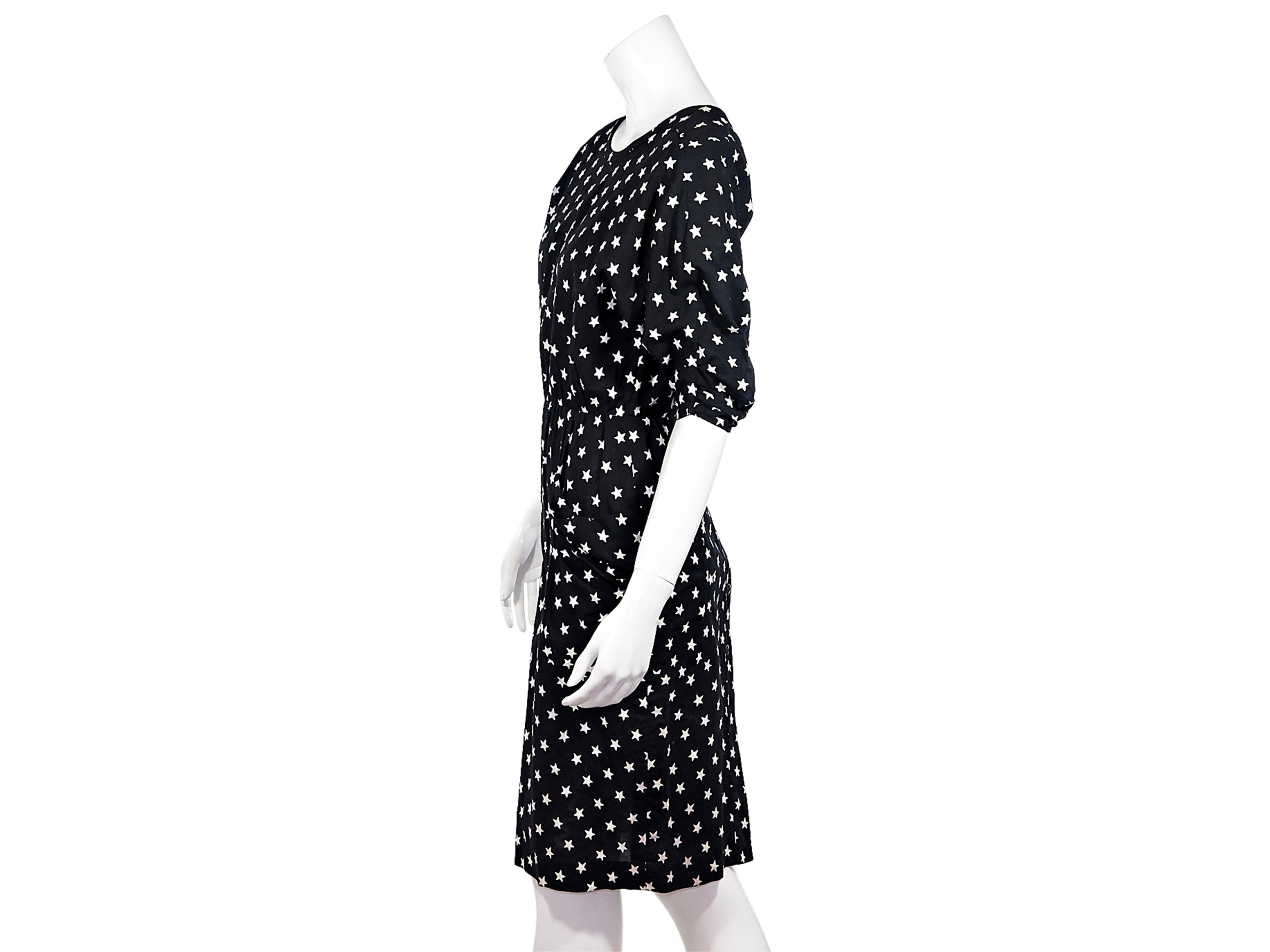 Product details:  Vintage black printed cotton dress by Fendi 365.  Scoop neck.  Elbow length sleeves.  Contrast star print. Concealed back zip. Cinched waist. Label size EU 42. 36