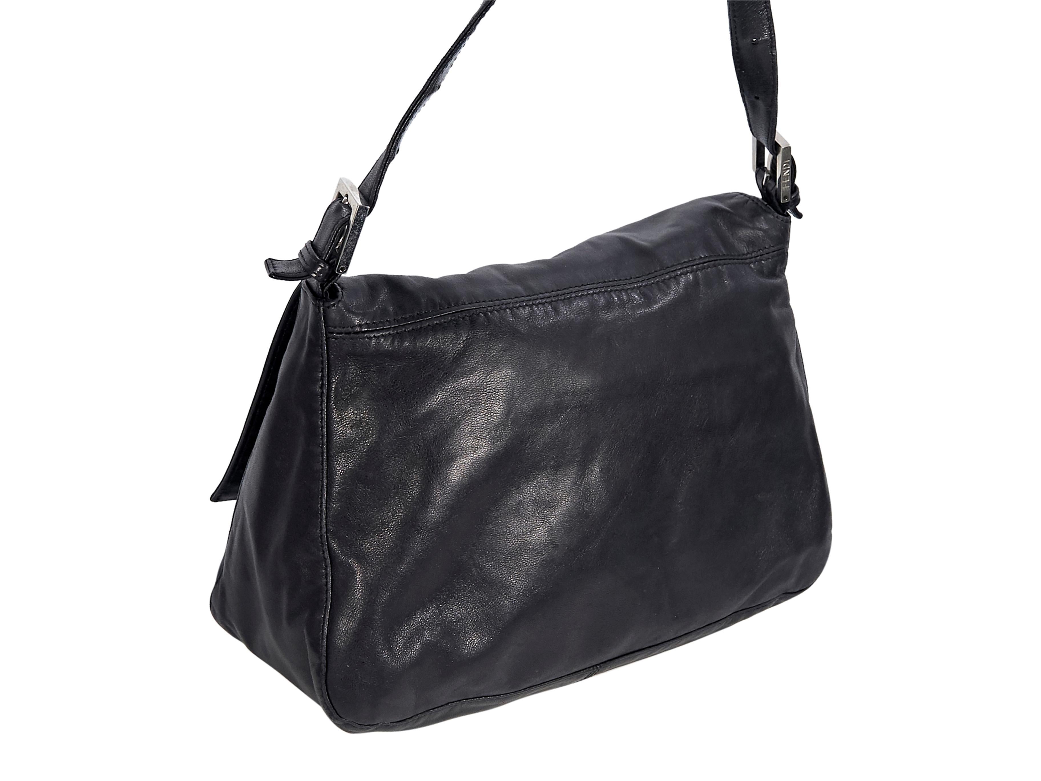 Product details:  Vintage black leather Mama Forever shoulder bag by Fendi.  Adjustable shoulder strap.  Front flap with magnetic snap closure.  Lined interior with inner zip pocket.  11