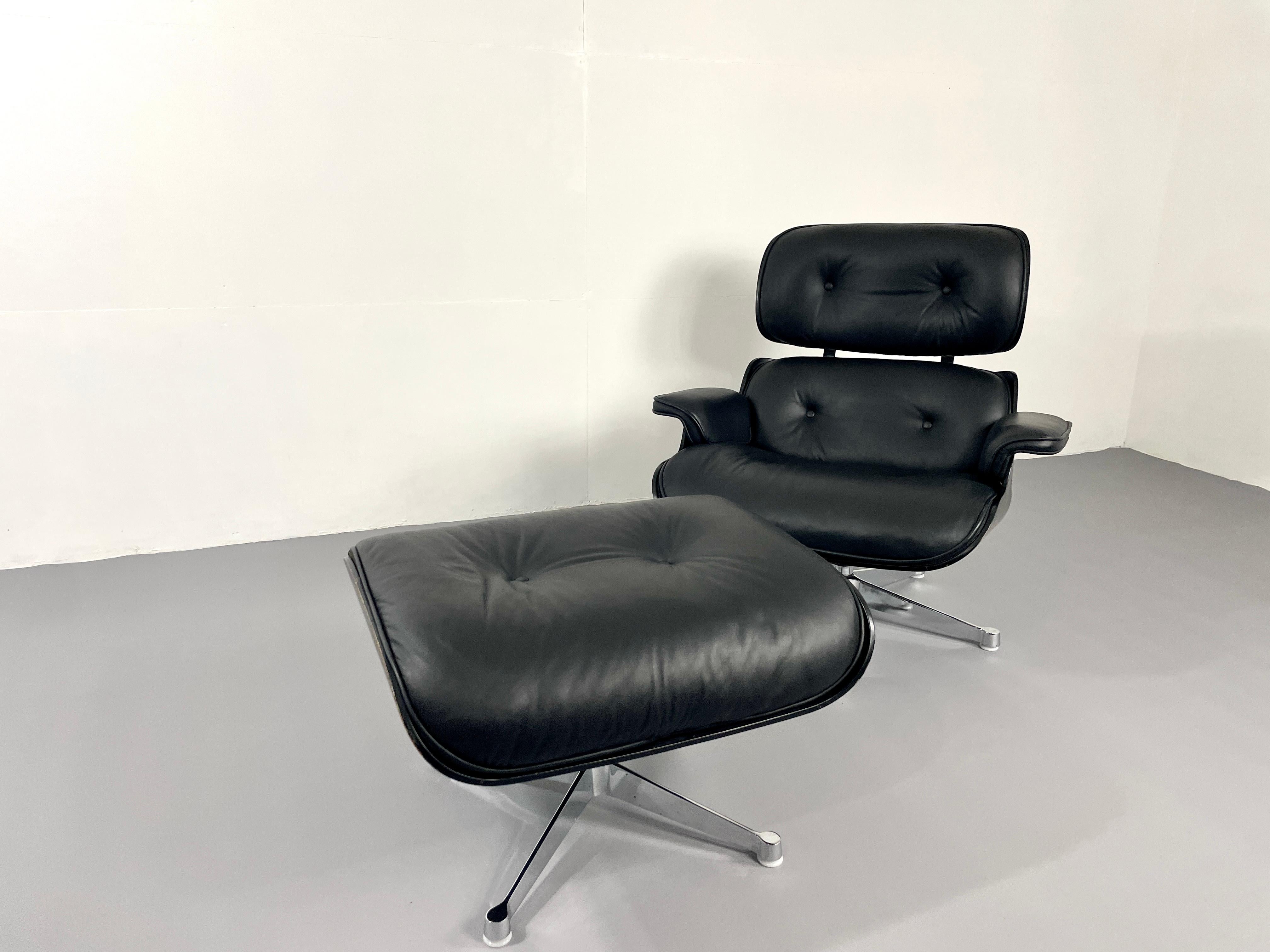 iconic lounge chair by Charles and Ray Eames. This icon does not need many words. It is probably the most famous and cozy Mid Century armchair. The chair was produced by Herman Miller. 
In the rare version with the black shell and chrome frame.