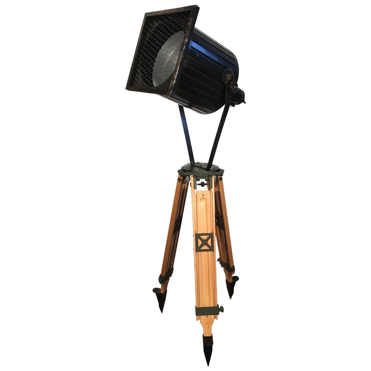 Black Vintage Industrial Spotlight on Wooden Tripod For Sale