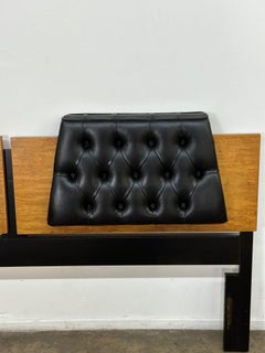 Black vinyl and burl-wood headboard
