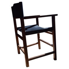 black walnut chair no. 4 with black leather seating and back  by Frank Buschmann
