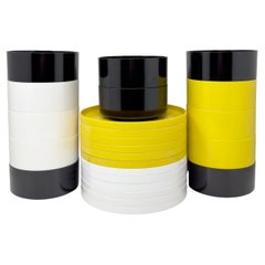 Platos negros, blancos y amarillos Massimo Vignelli para Heller - Set de 24