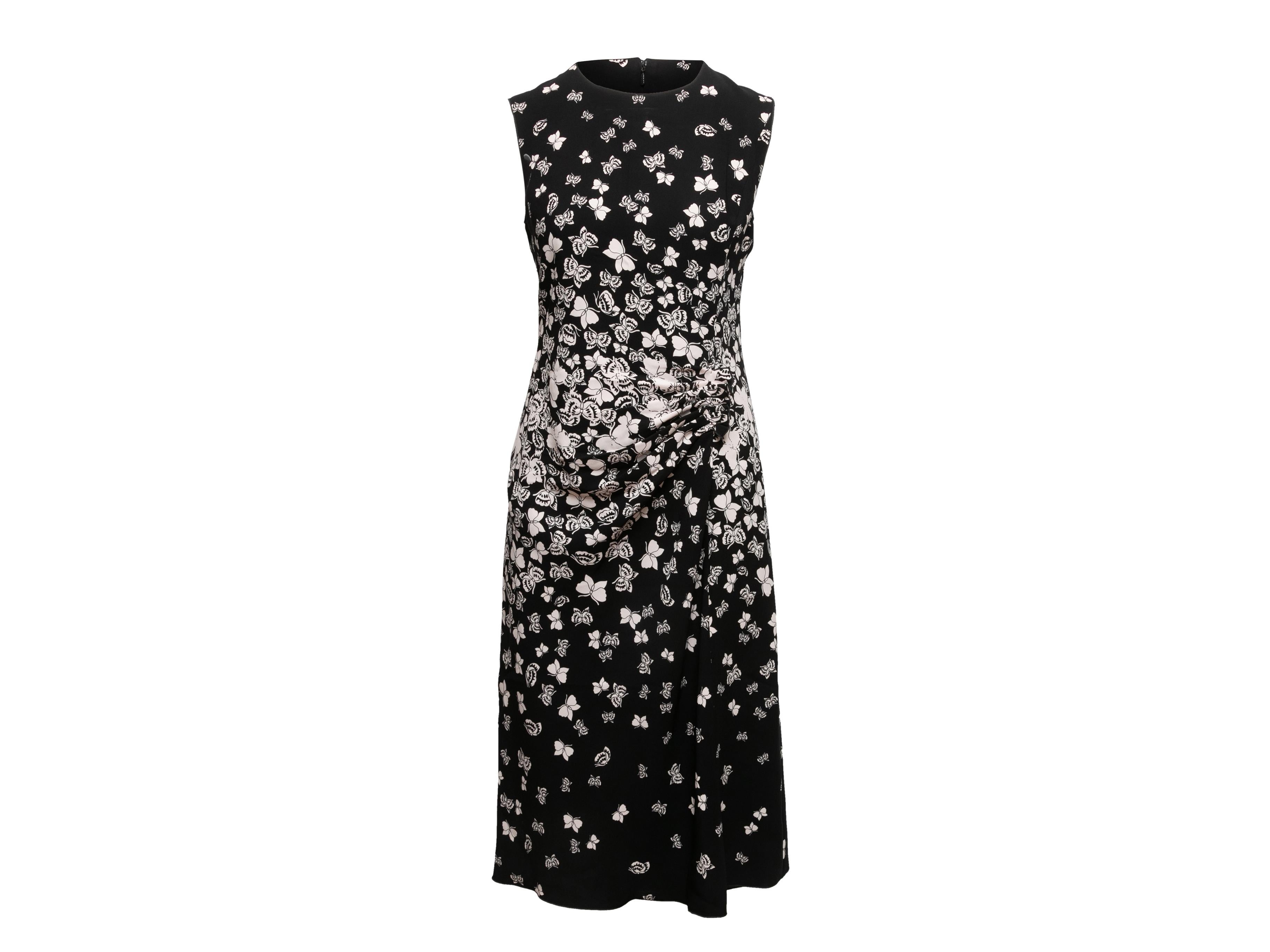 Black and white butterfly print dress by Bottega Veneta. Crew neck. Sleeveless. Gathering at front waist side. Zip closure at back. 34