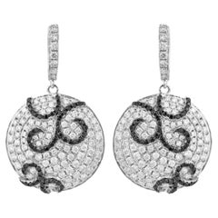 Boucles d'oreilles en or blanc 14 carats avec diamants noirs et blancs