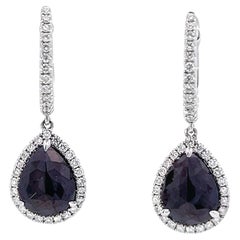 Clous d'oreilles élégants en argent sterling avec halo de diamants noirs et blancs scintillants