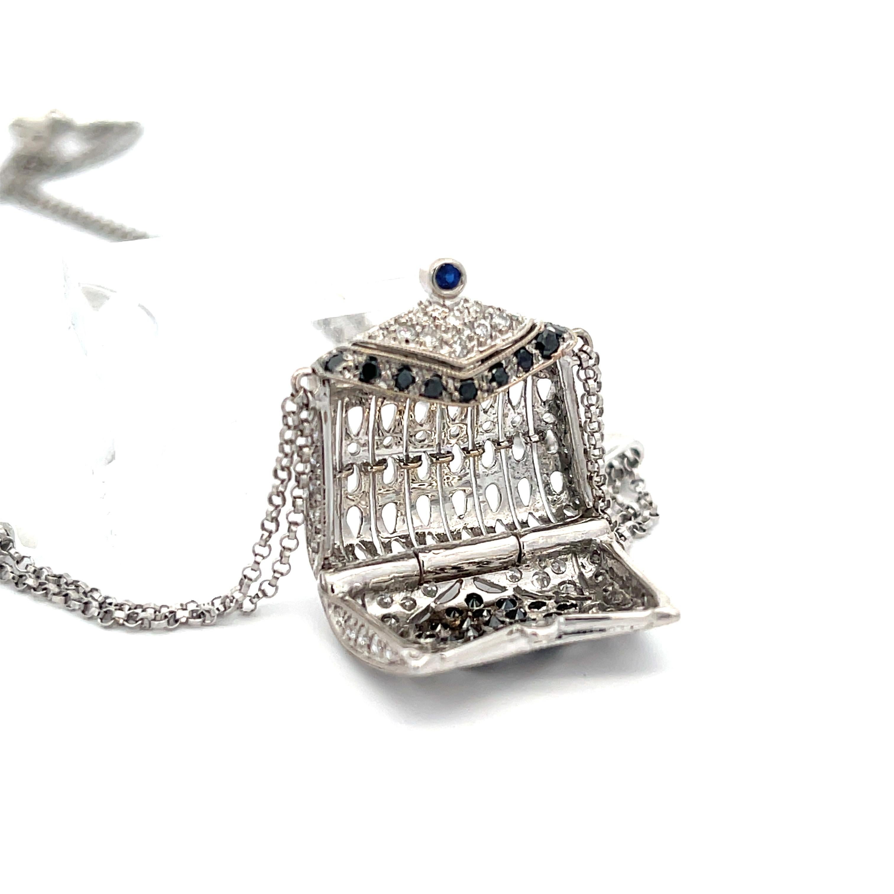 Purse Pendant Necklace in 18k White Gold. The purse pendant features black and white diamonds, on a 16